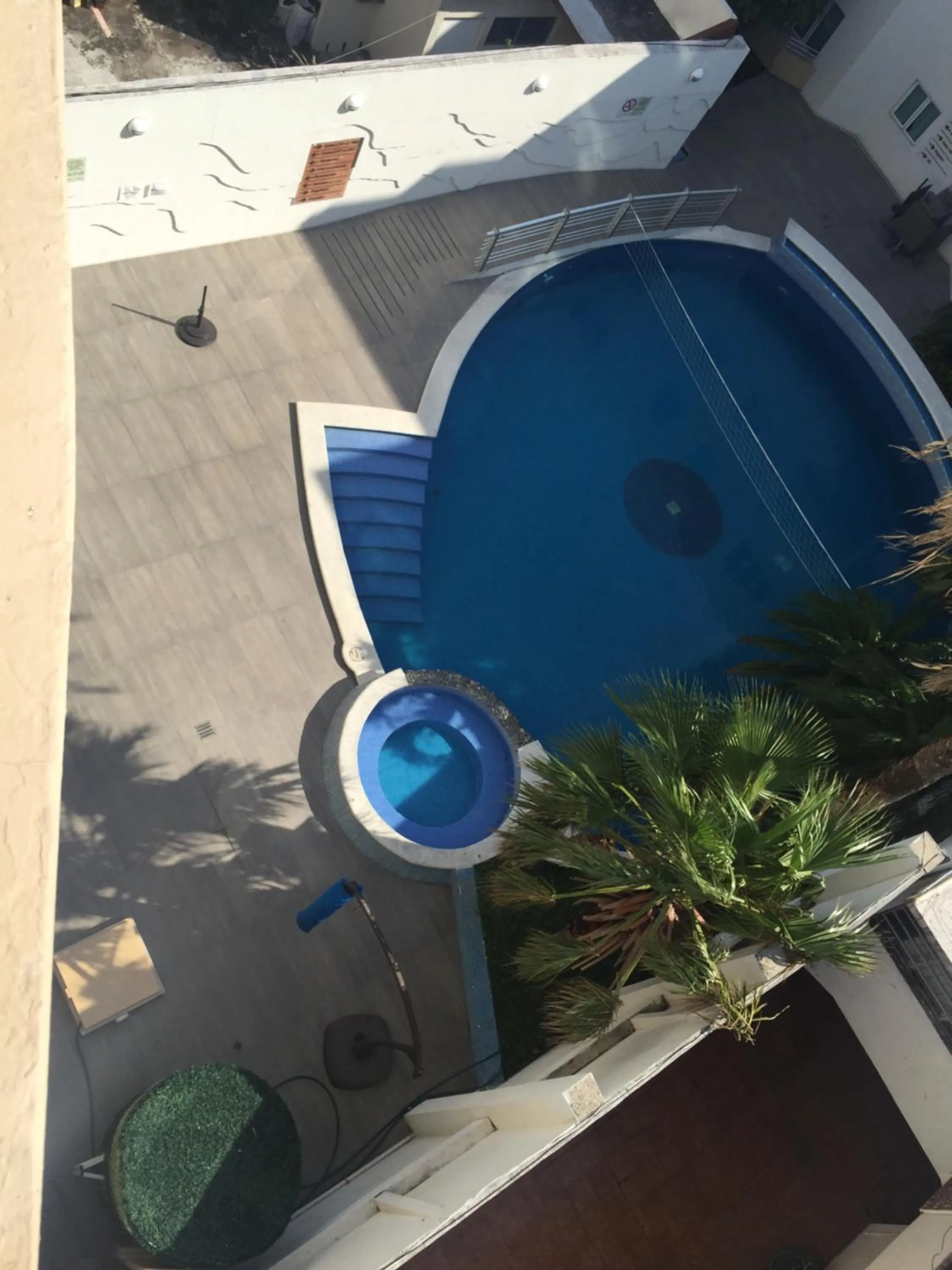 Pool view in Angeles Suites & Hotel