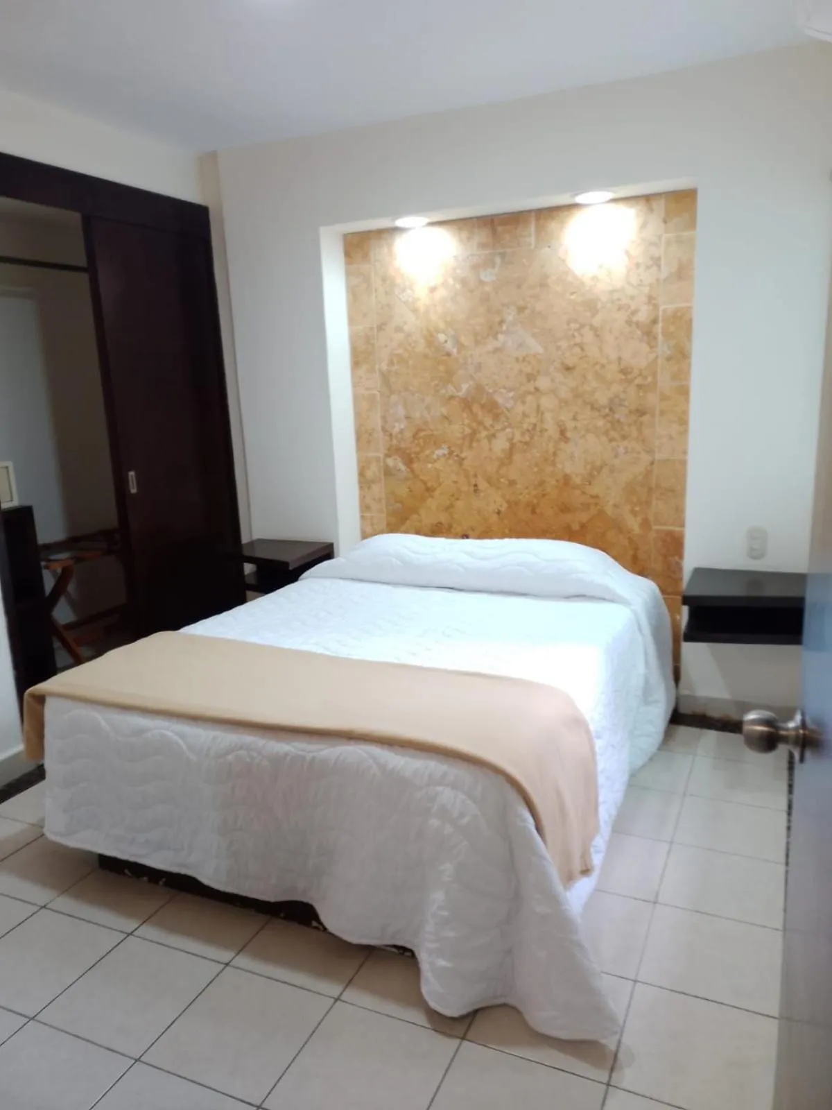 Bedroom in Angeles Suites & Hotel