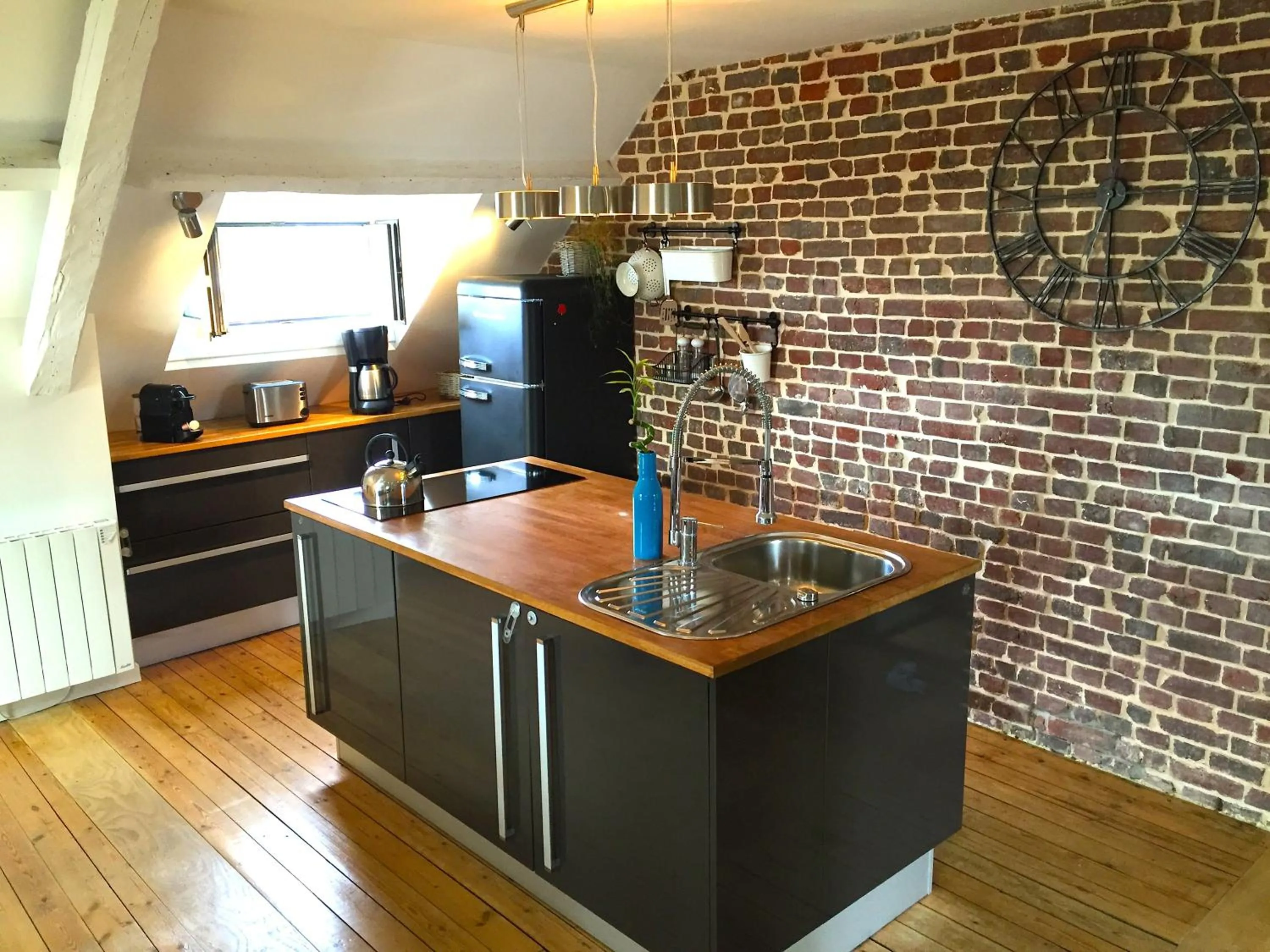 Kitchen or kitchenette in Le Loft du Clocheton