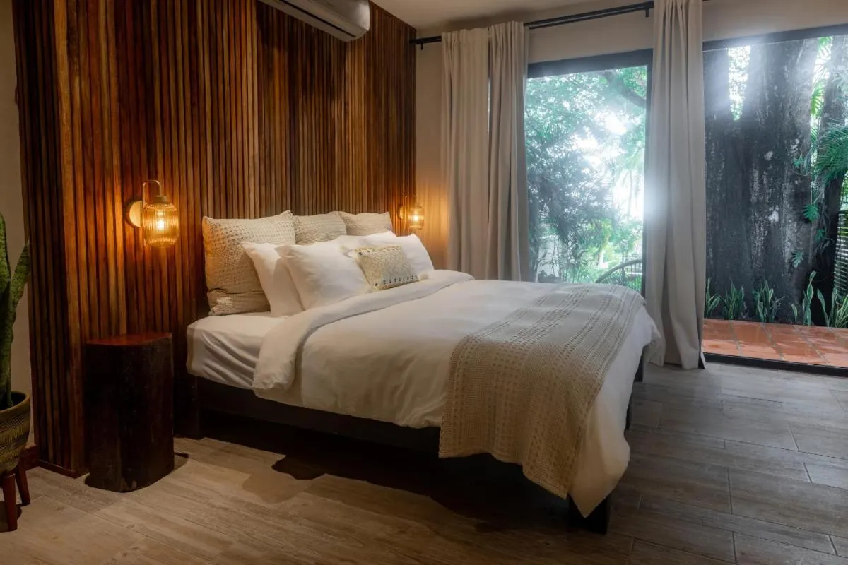 Bed in Sansara Surf Yoga & Resort