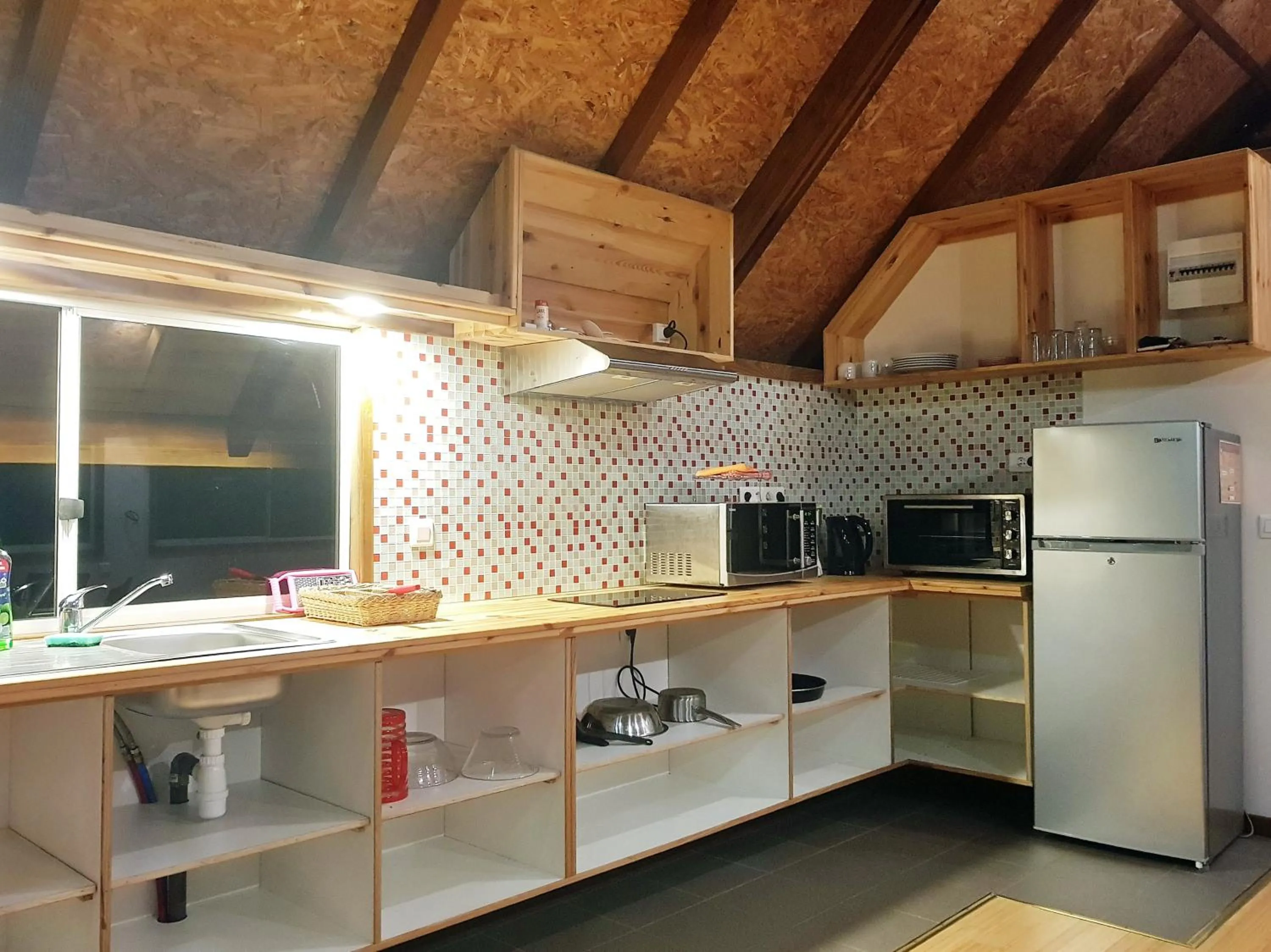 Kitchen or kitchenette in Pension Les Trois Cascades