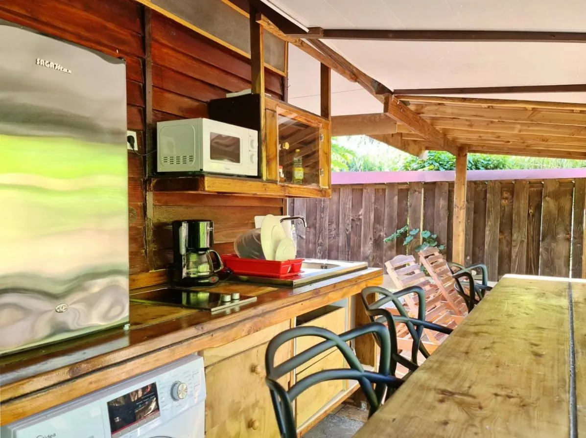 Kitchen or kitchenette in Pension Les Trois Cascades