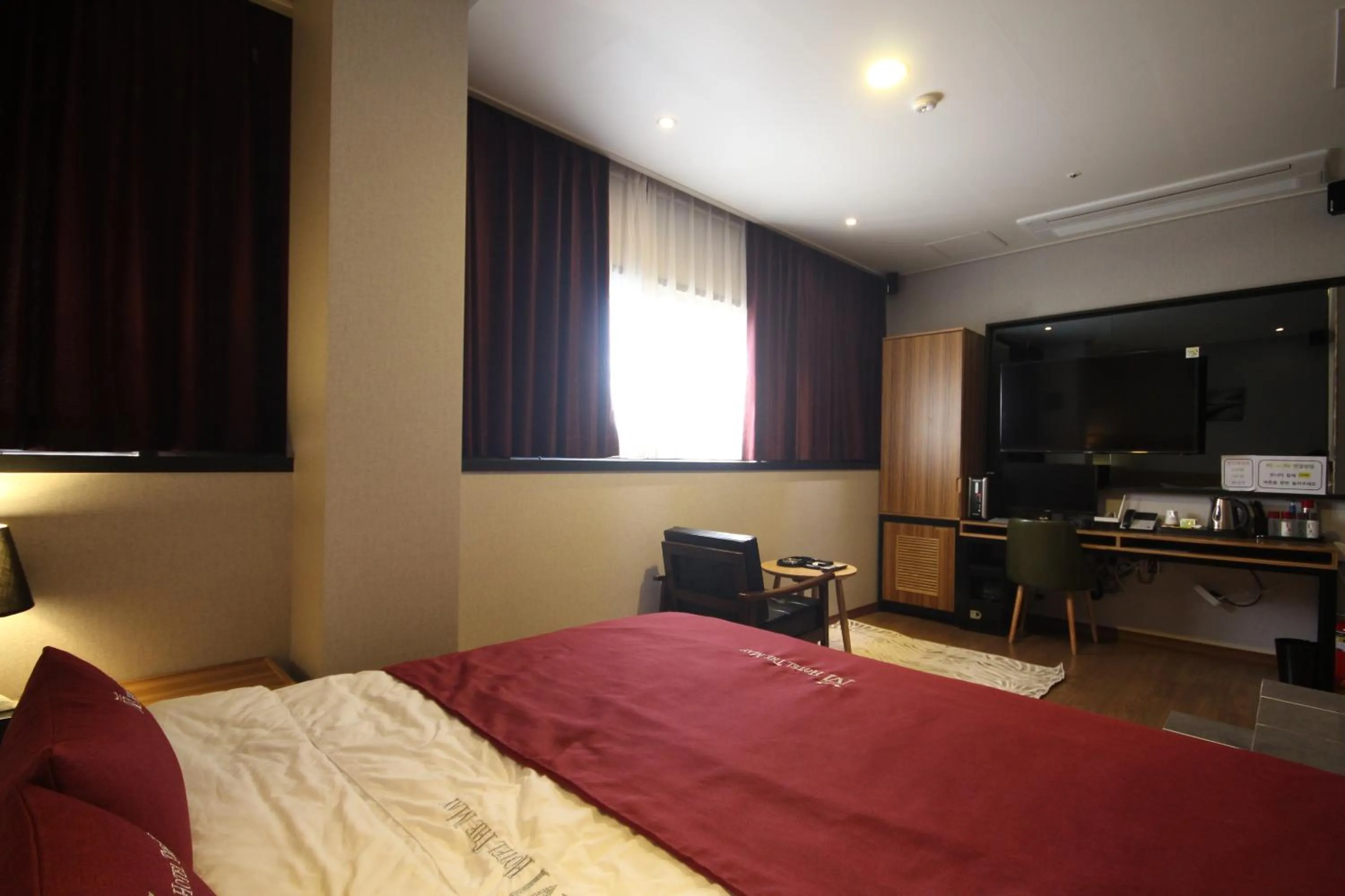 Bedroom, Bed in The May Hotel