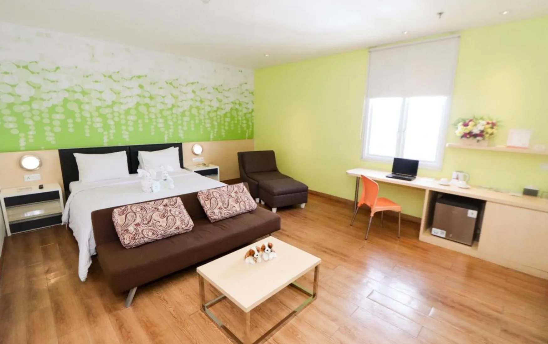 Bed in Zest Jemursari by Swiss-Belhotel International