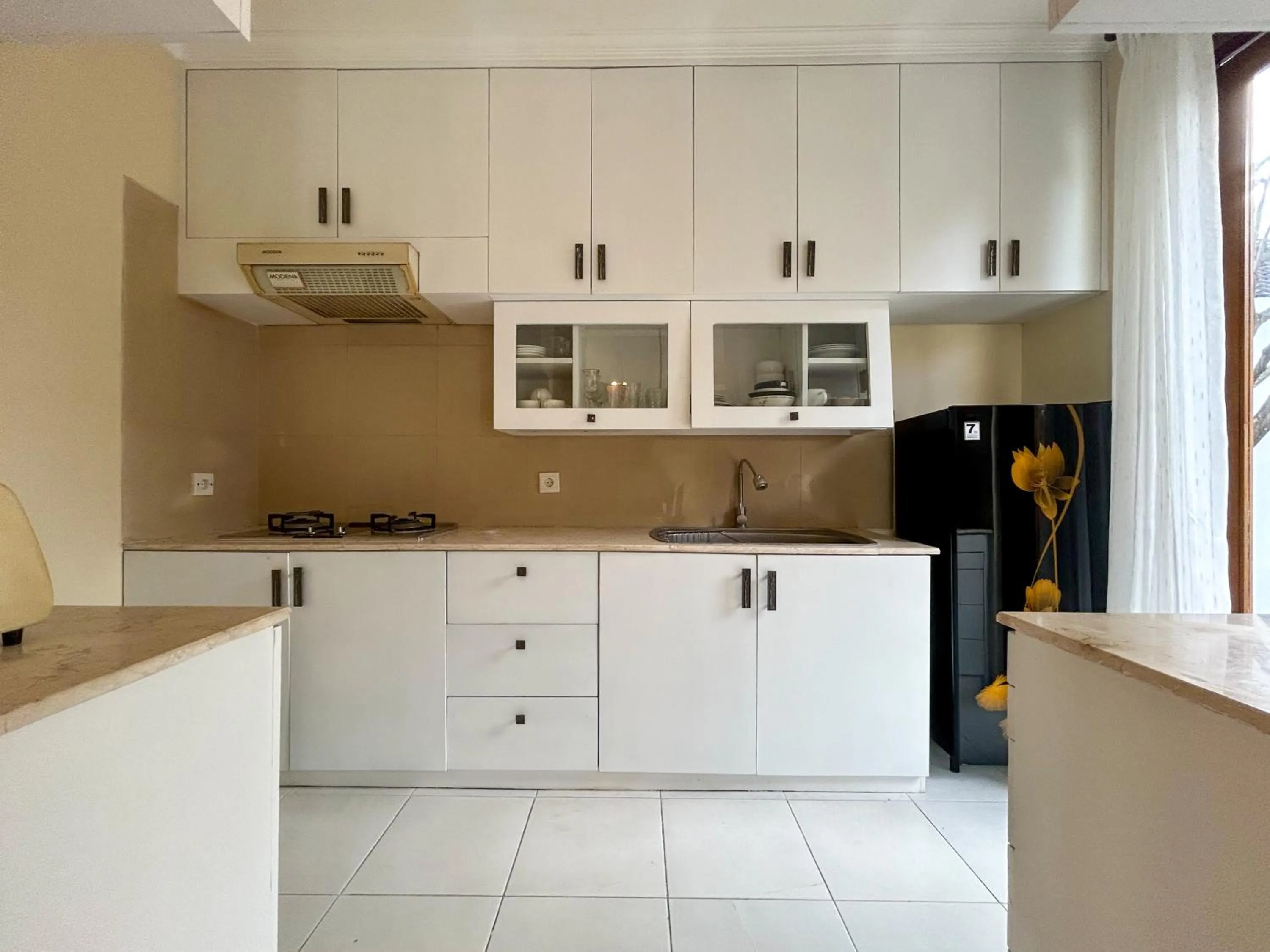 Kitchen or kitchenette in Sayang Taman Villas