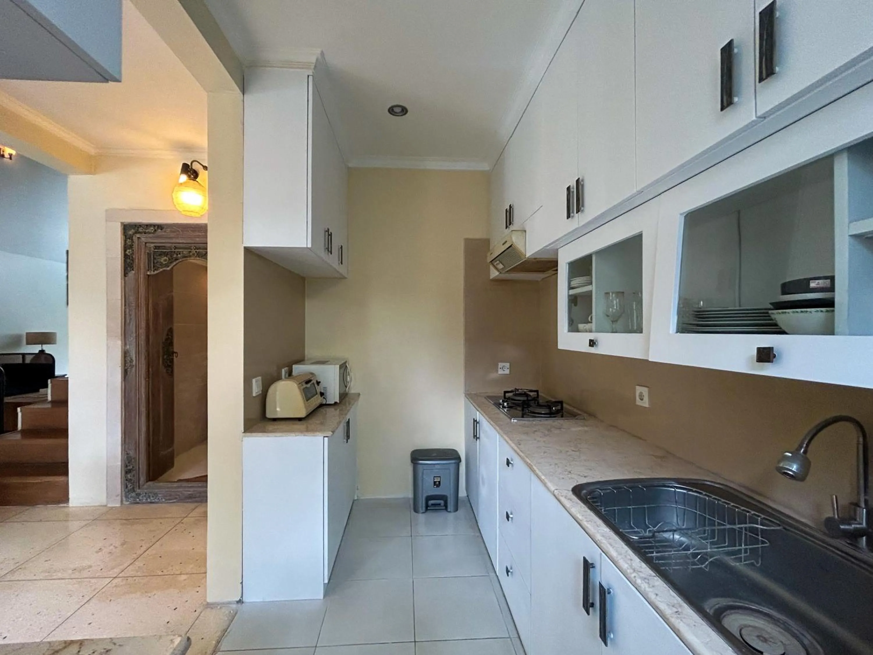 Kitchen or kitchenette in Sayang Taman Villas