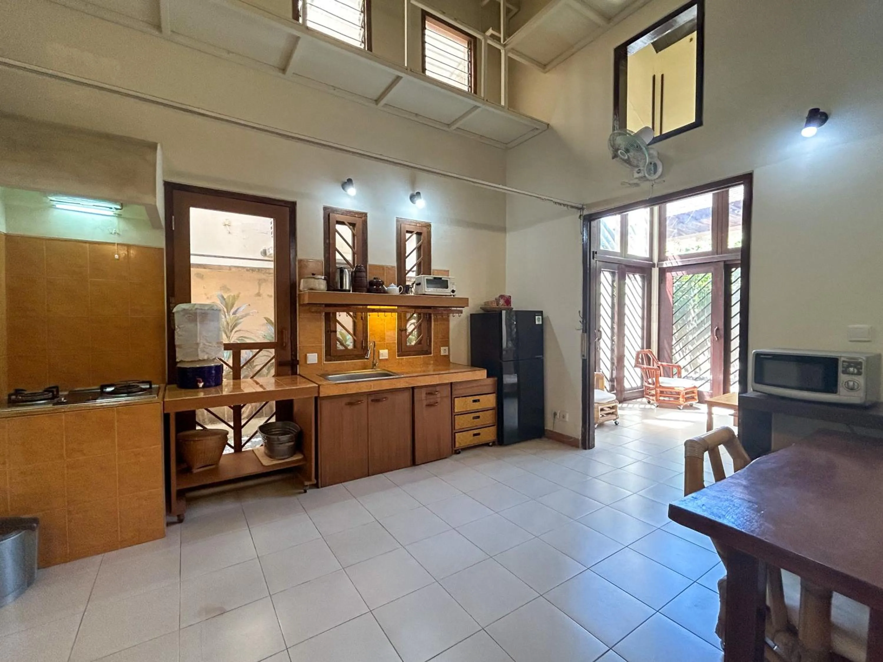 Kitchen or kitchenette in Sayang Taman Villas