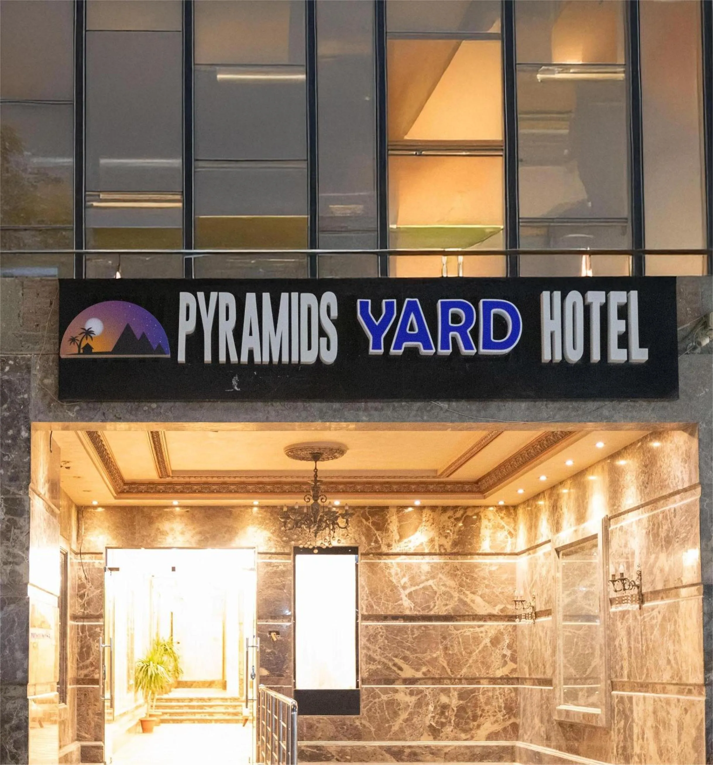Property logo or sign in Pyramids Yard Hotel