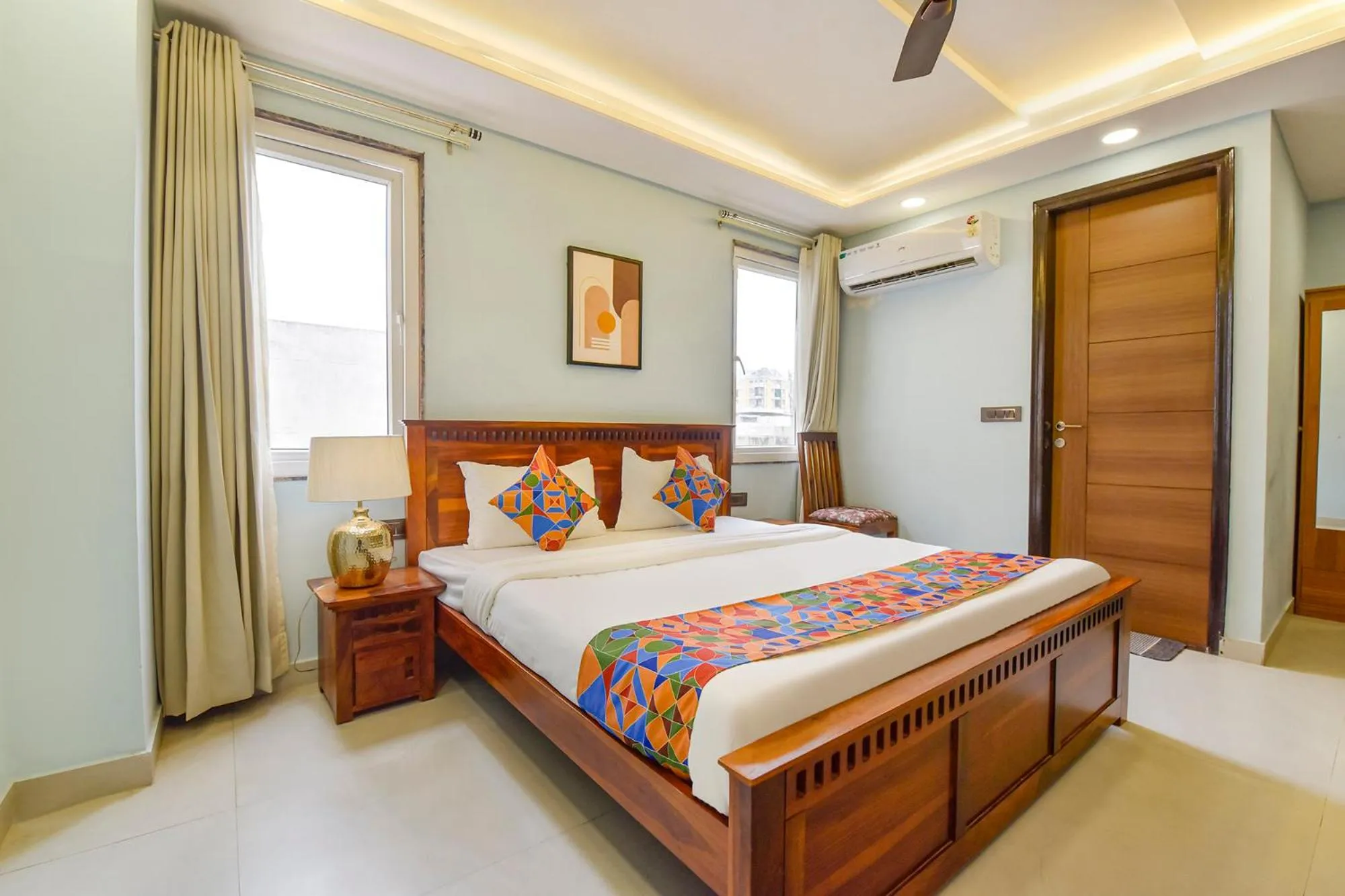 Bed in FabHotel Pink Palace Raja Park