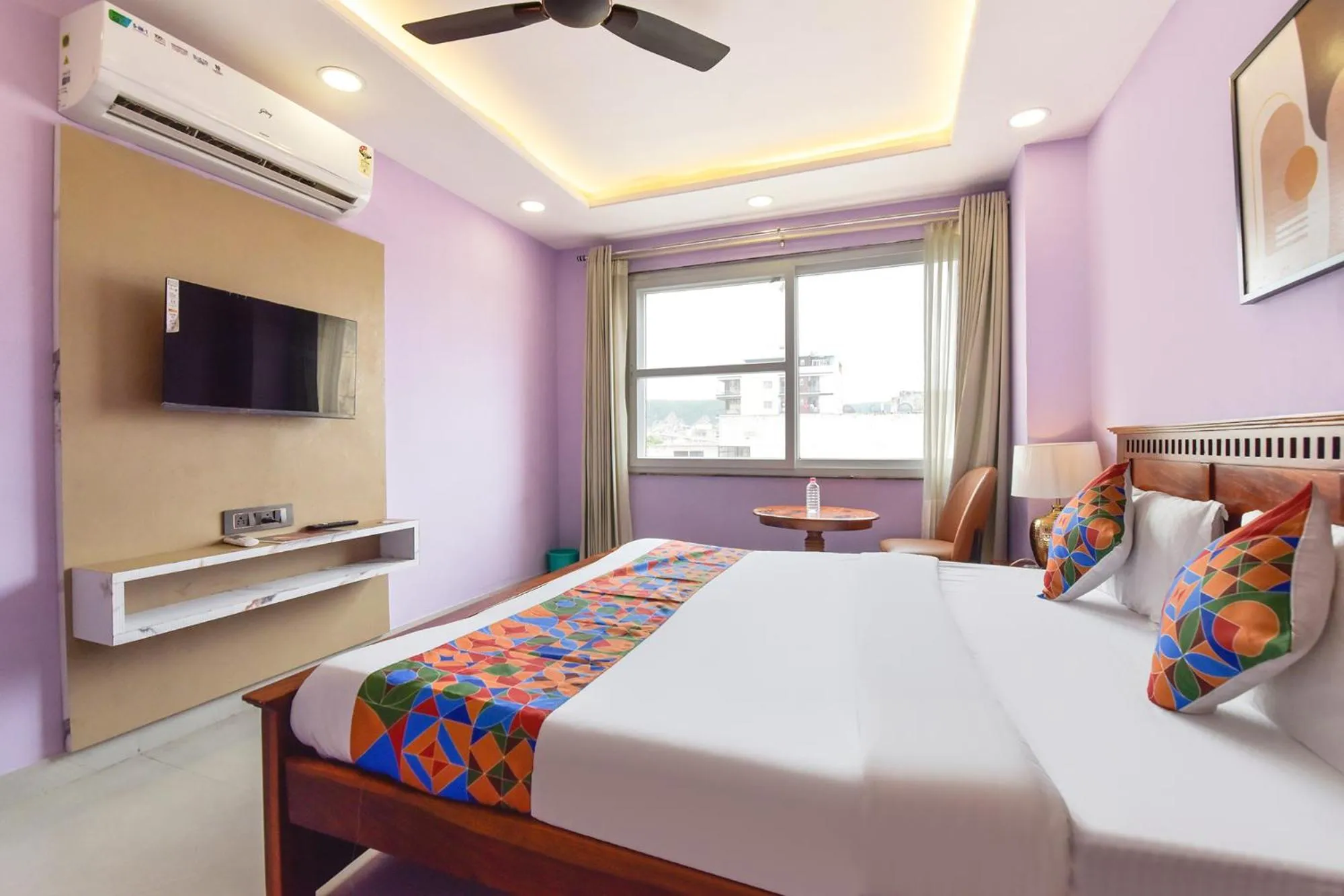 Bed in FabHotel Pink Palace Raja Park