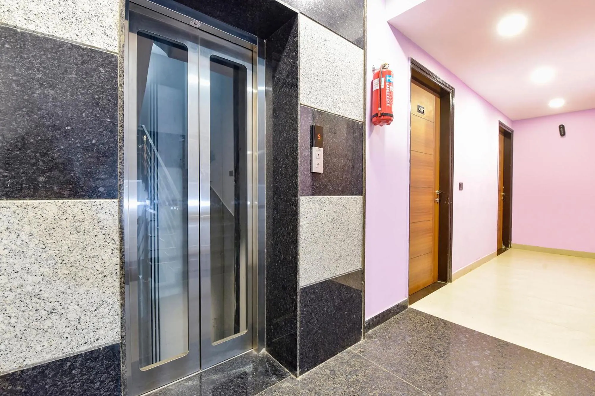 elevator in FabHotel Pink Palace Raja Park