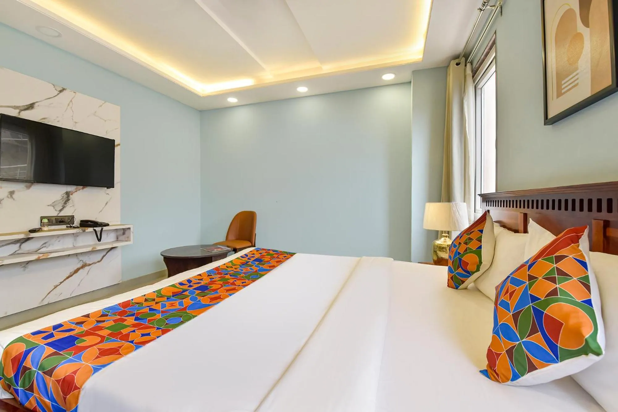 Bed in FabHotel Pink Palace Raja Park