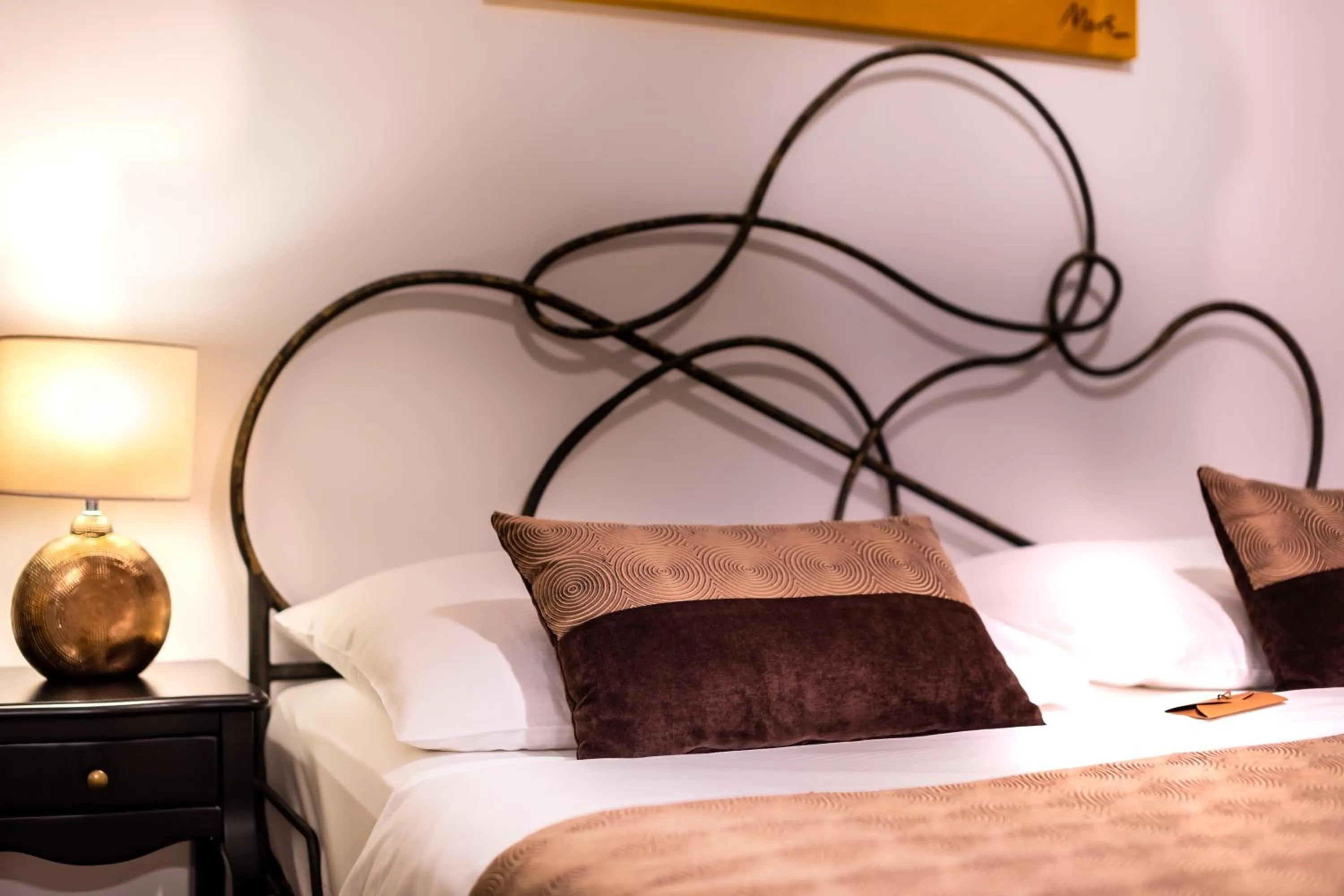 Bed in Hotel Heritage Forza