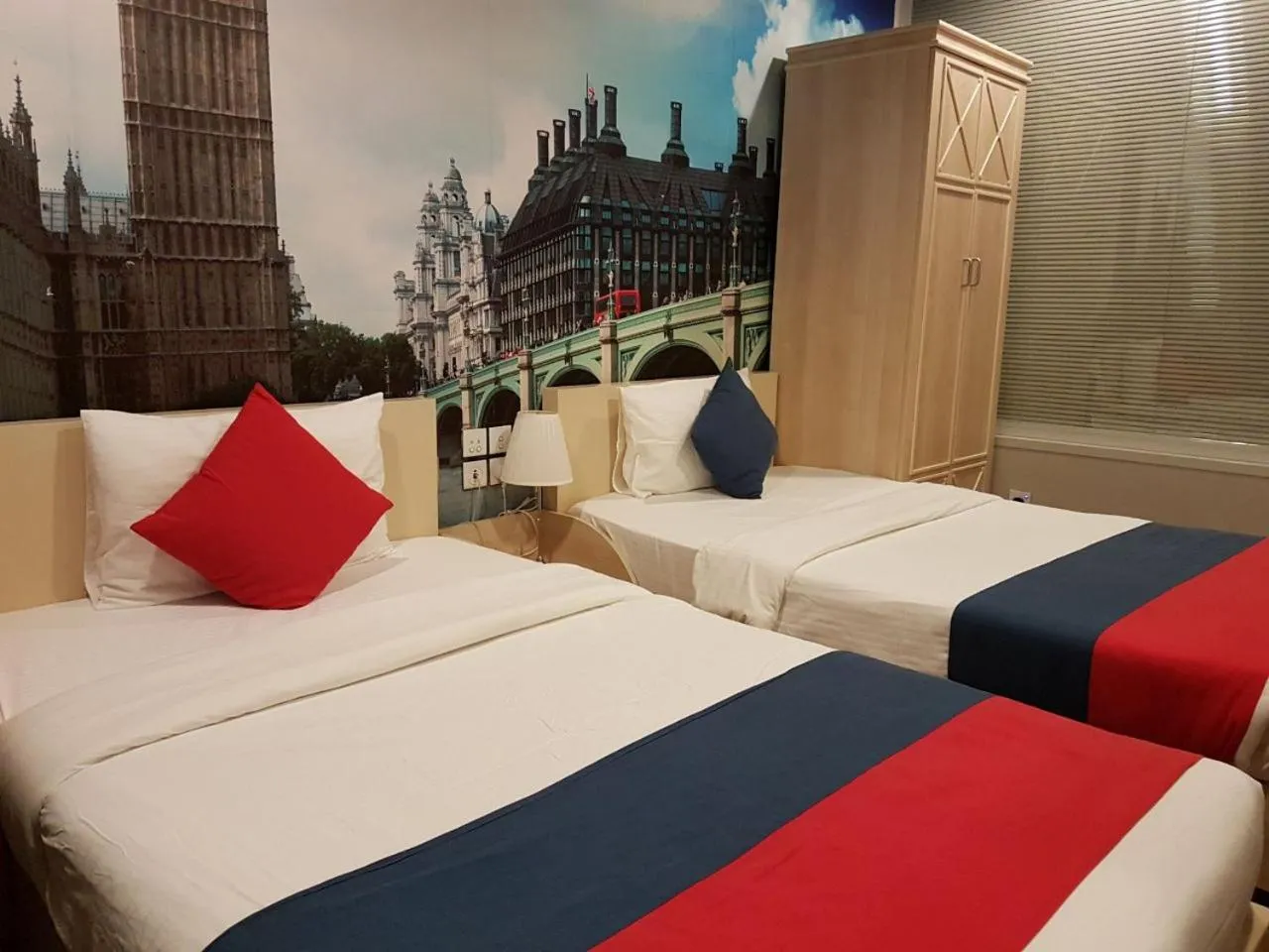 Bed in Reflections Hotel