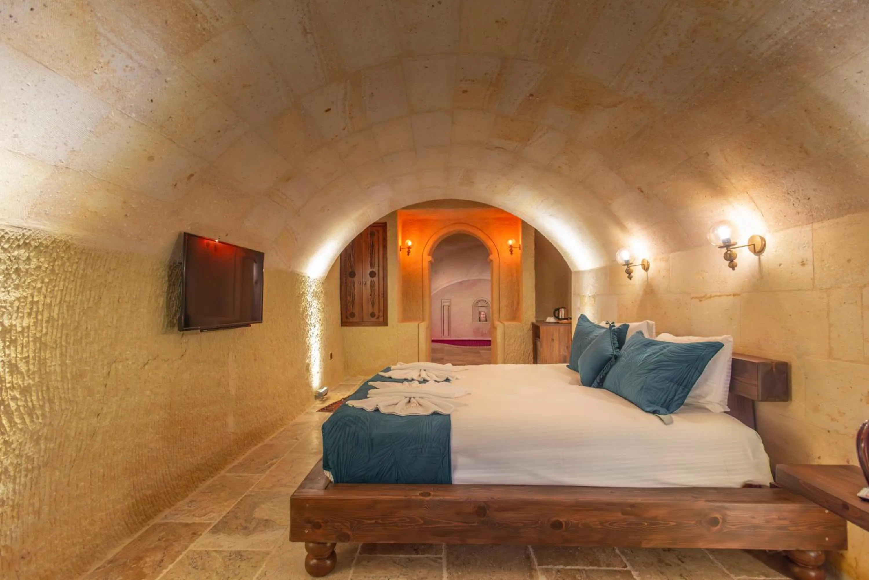 Bed in Lagoon Cave Suites