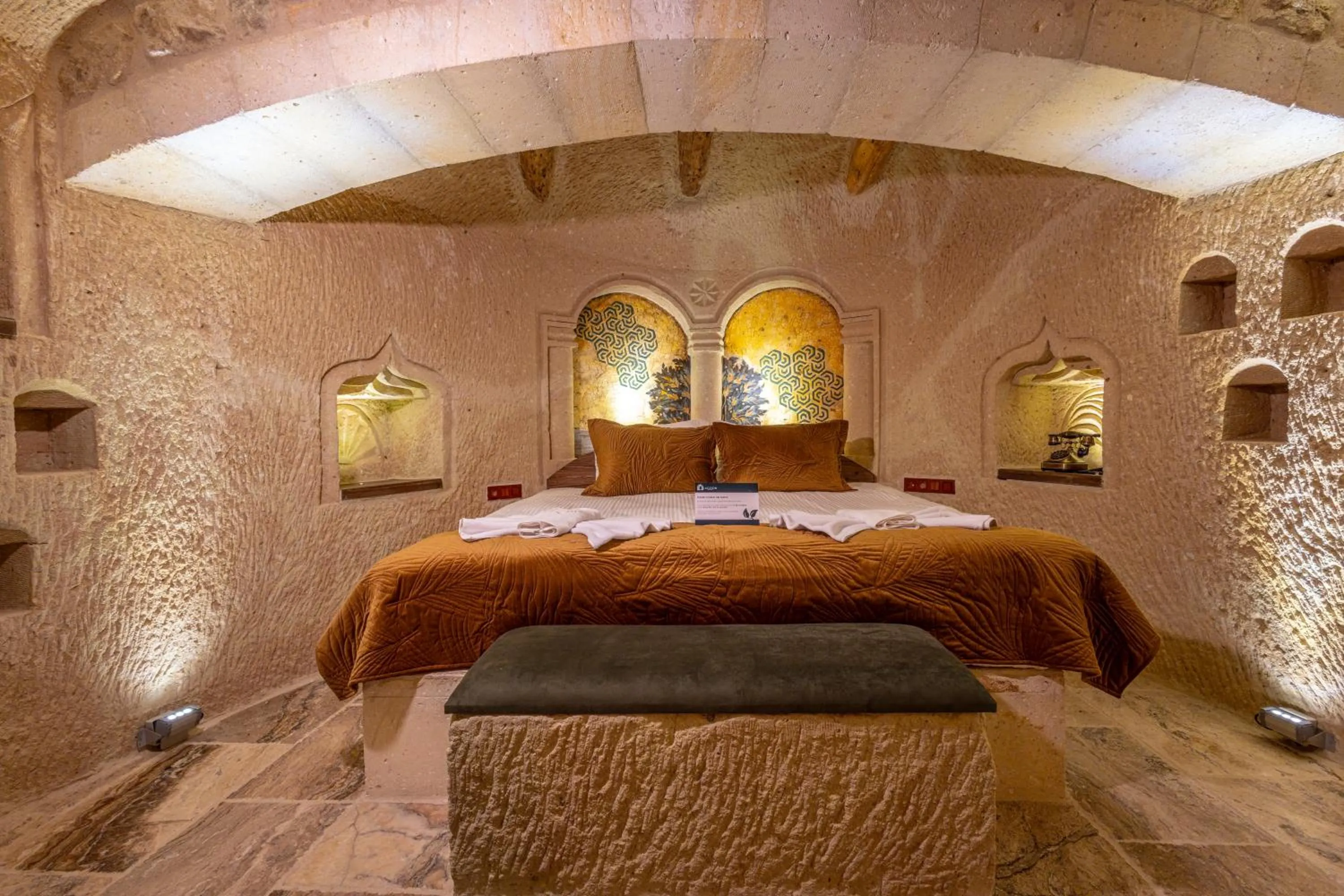 Bed in Lagoon Cave Suites