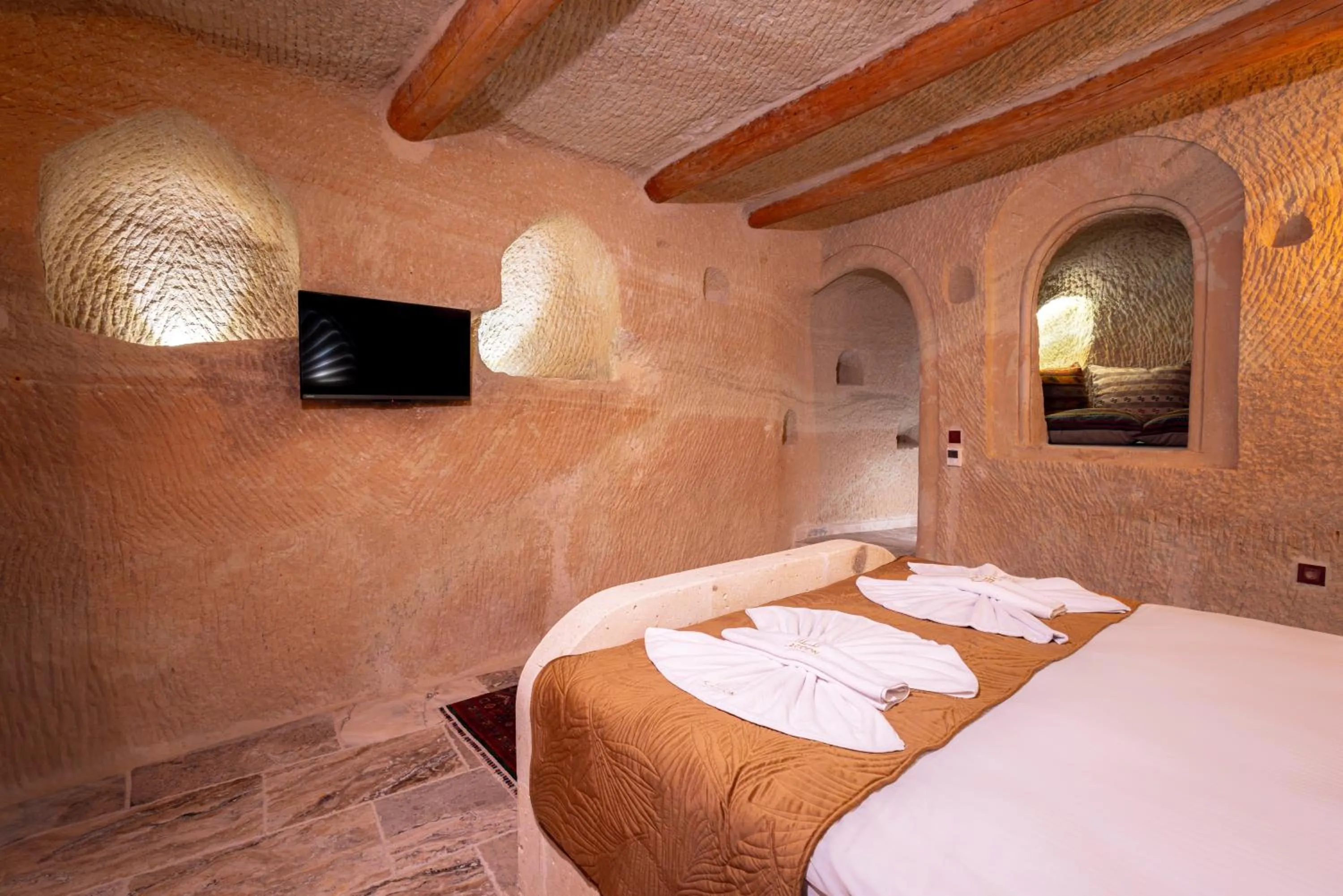 Bedroom, Bed in Lagoon Cave Suites