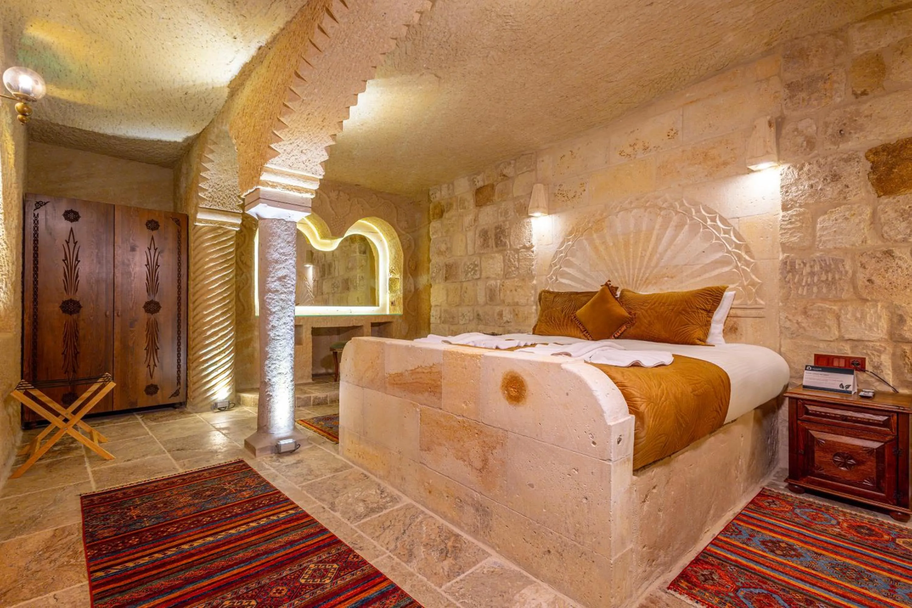 Bed in Lagoon Cave Suites
