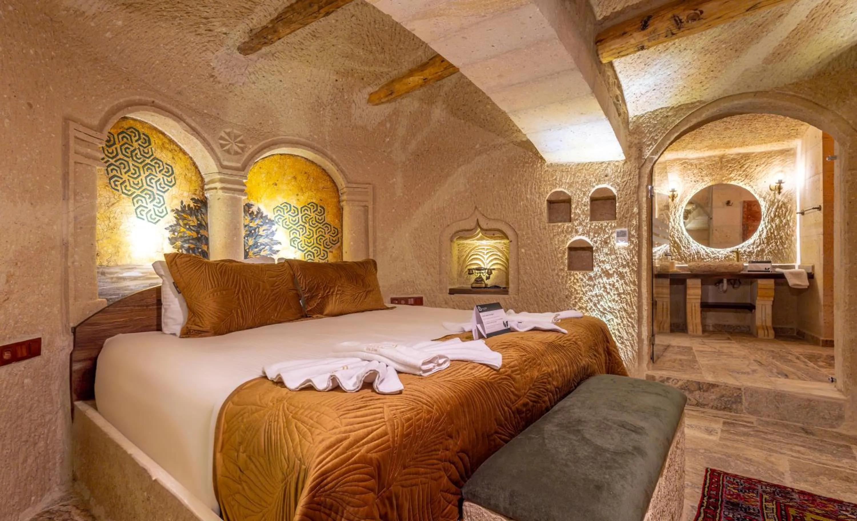 Bed in Lagoon Cave Suites