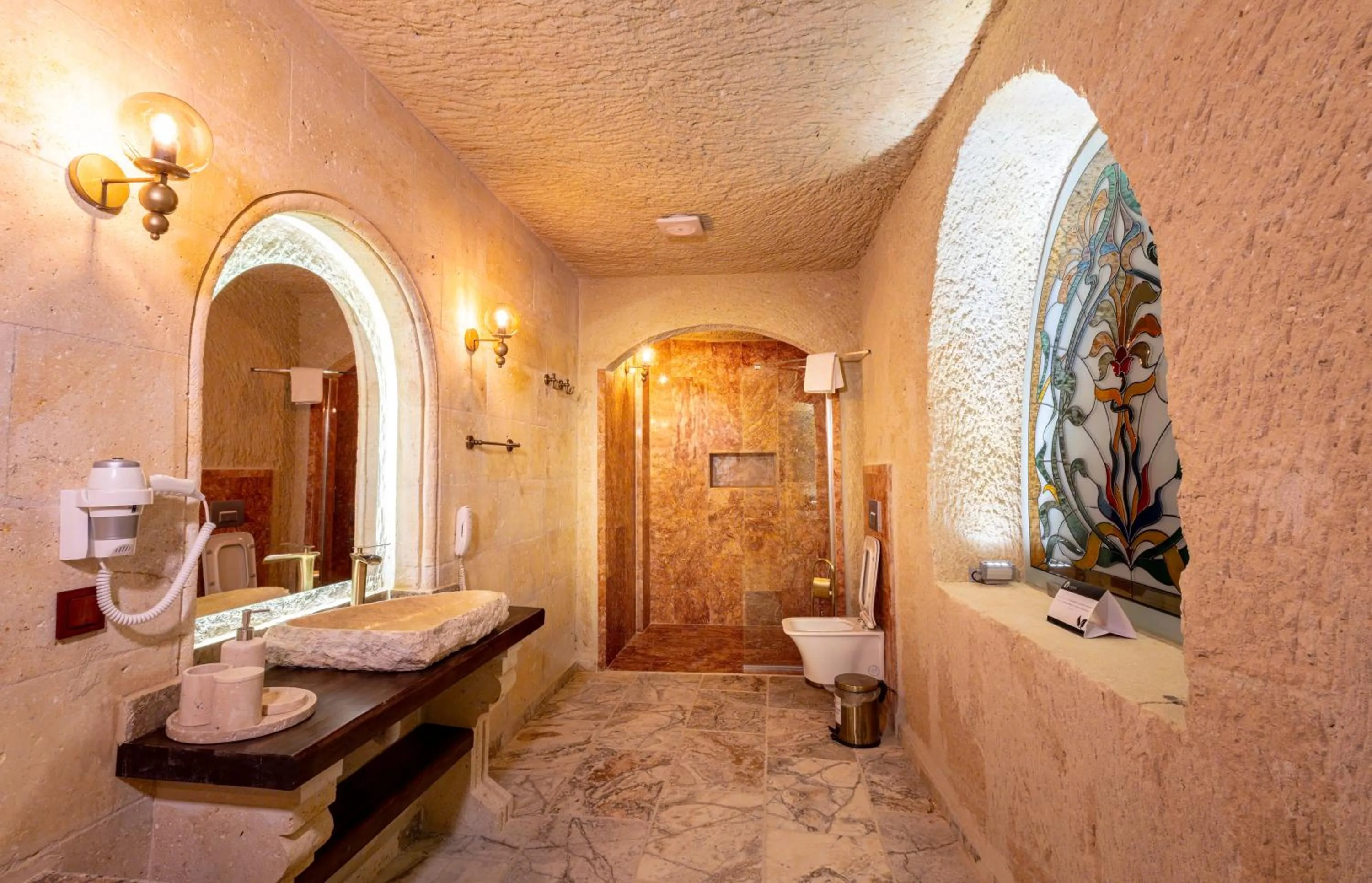 Toilet in Lagoon Cave Suites