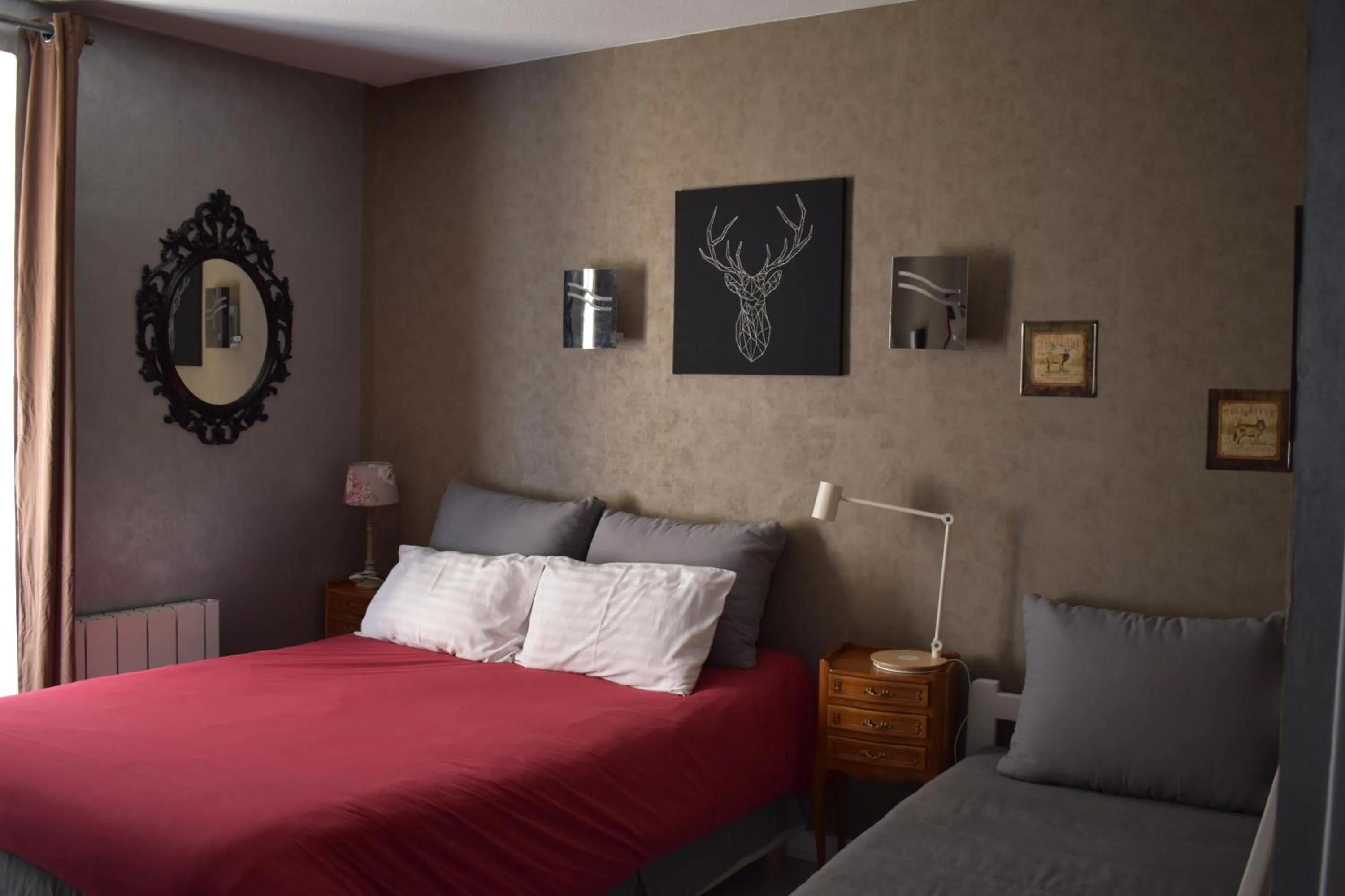 Bedroom in Hôtel Le Mélèze