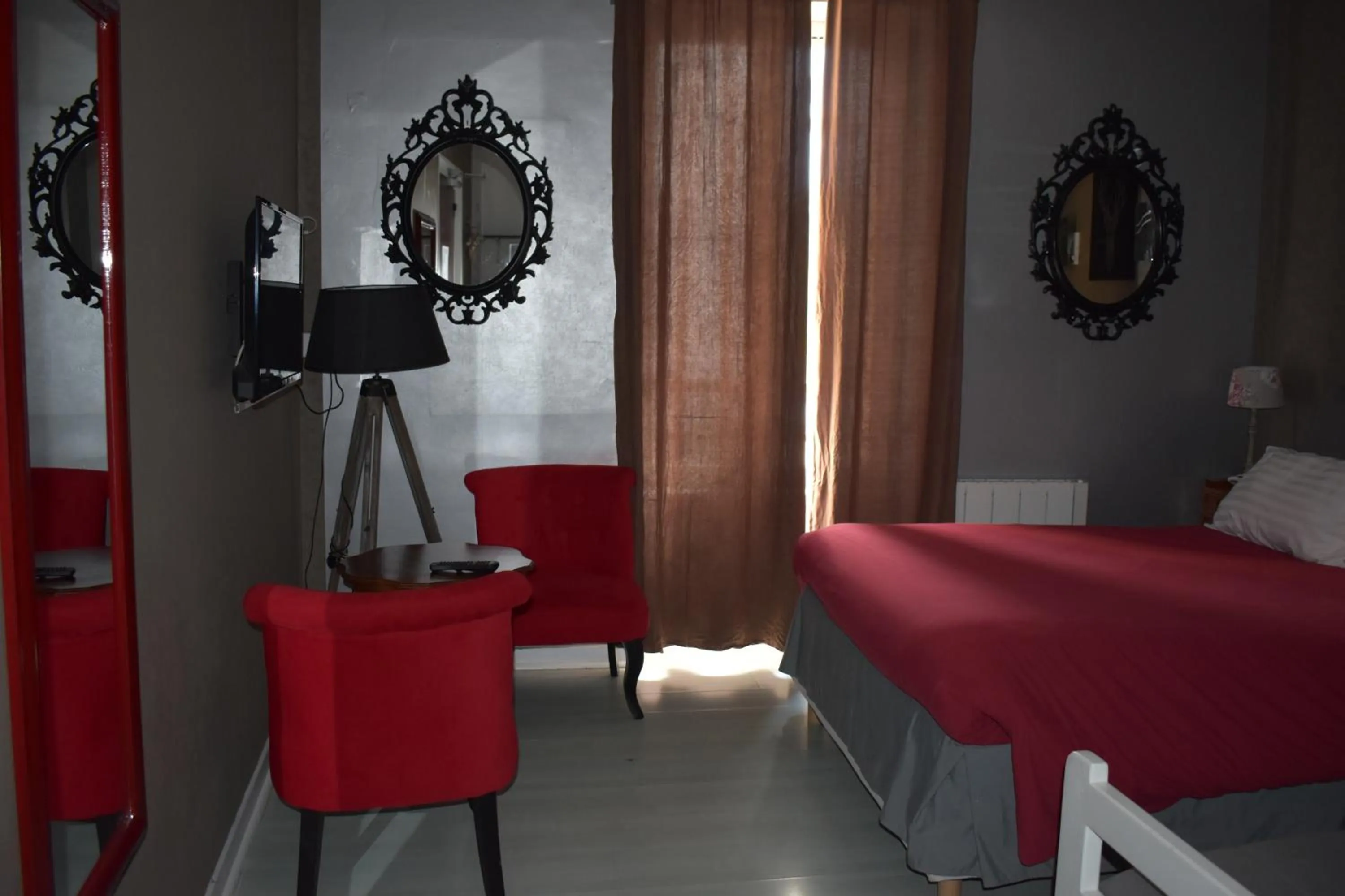 Bedroom in Hôtel Le Mélèze