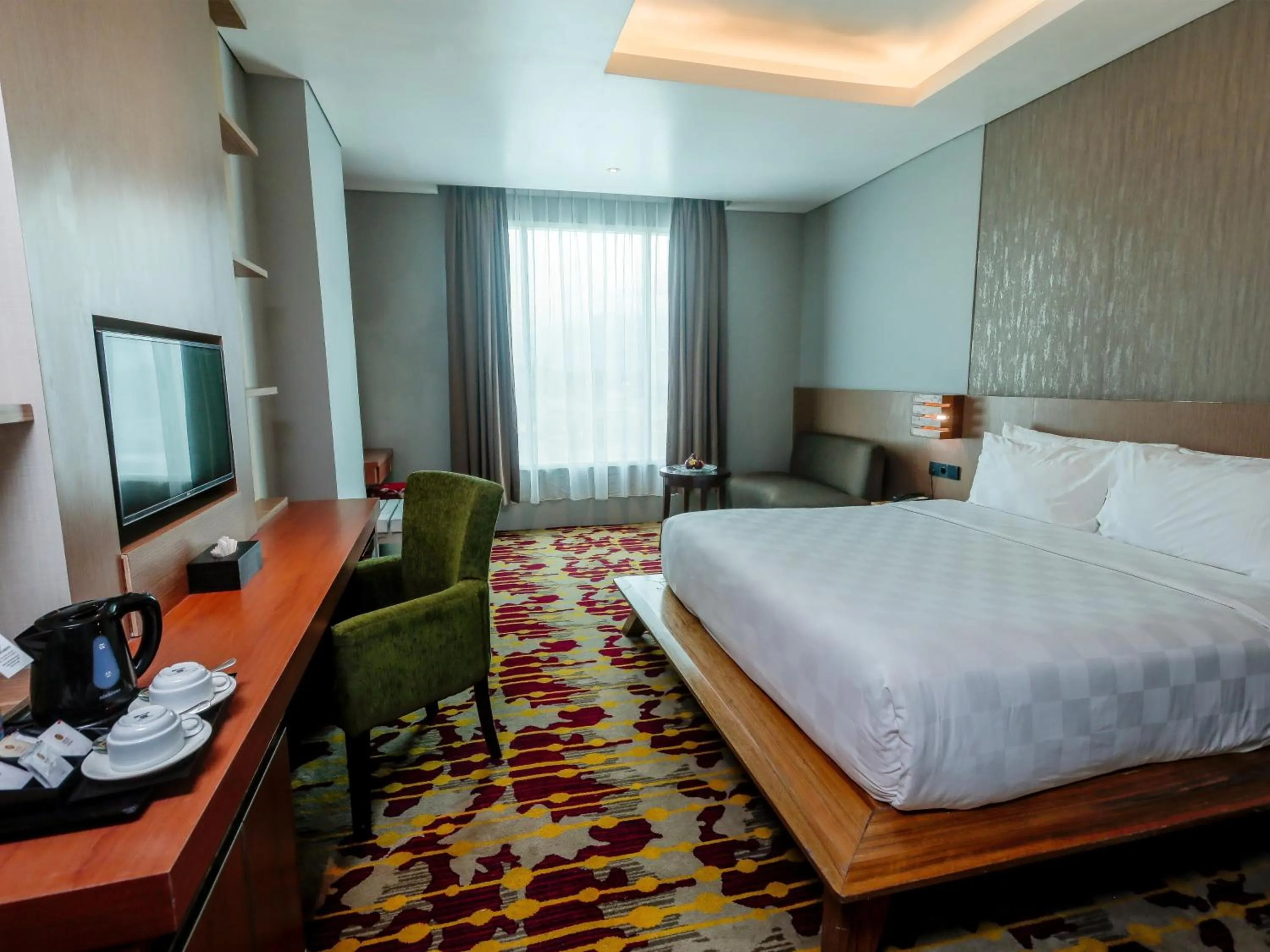 Bed in Grand Sya Hotel