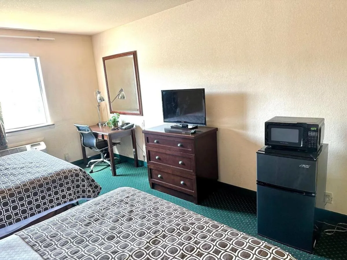 Bed in Haven Inn & Suites