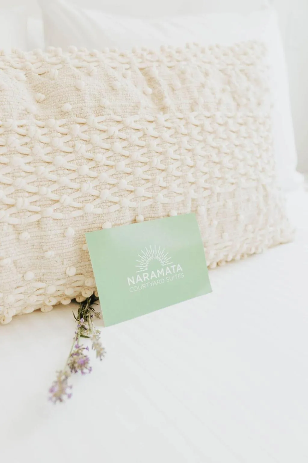 Bed in Naramata Courtyard Suites