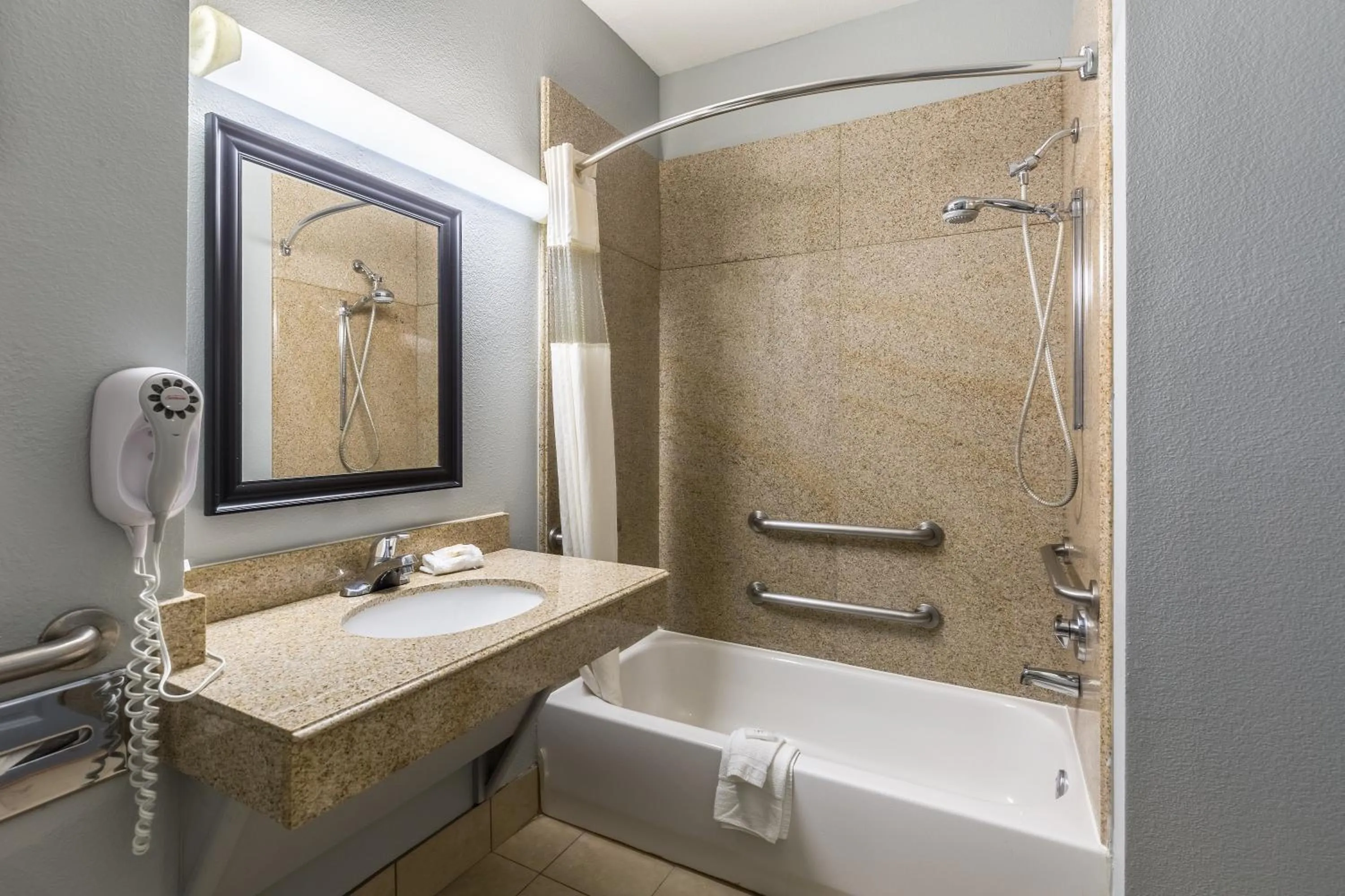 Bathroom in Platinum Inn & Suites Webster