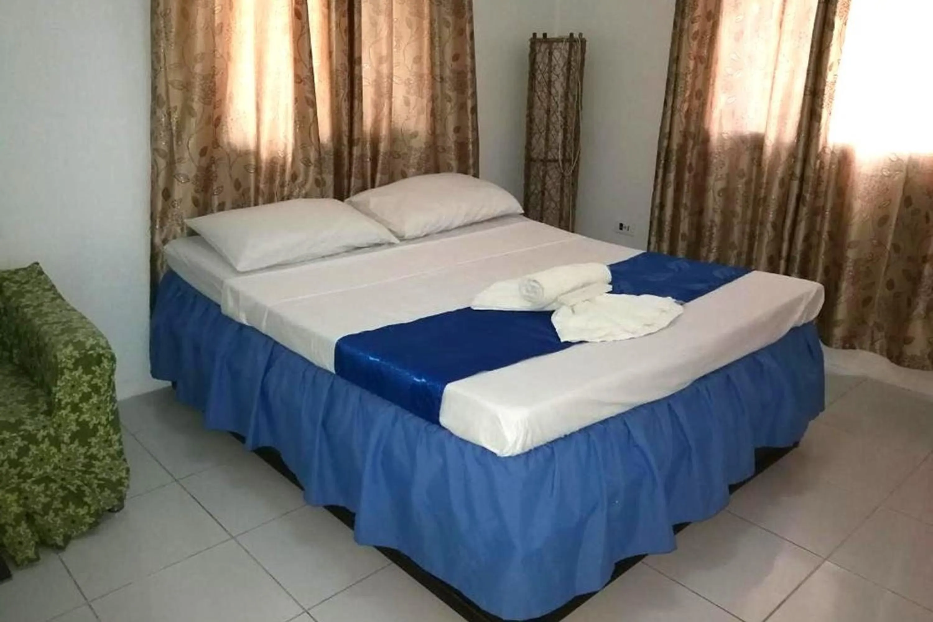 Bed in Bellevue Resort Puerto Galera