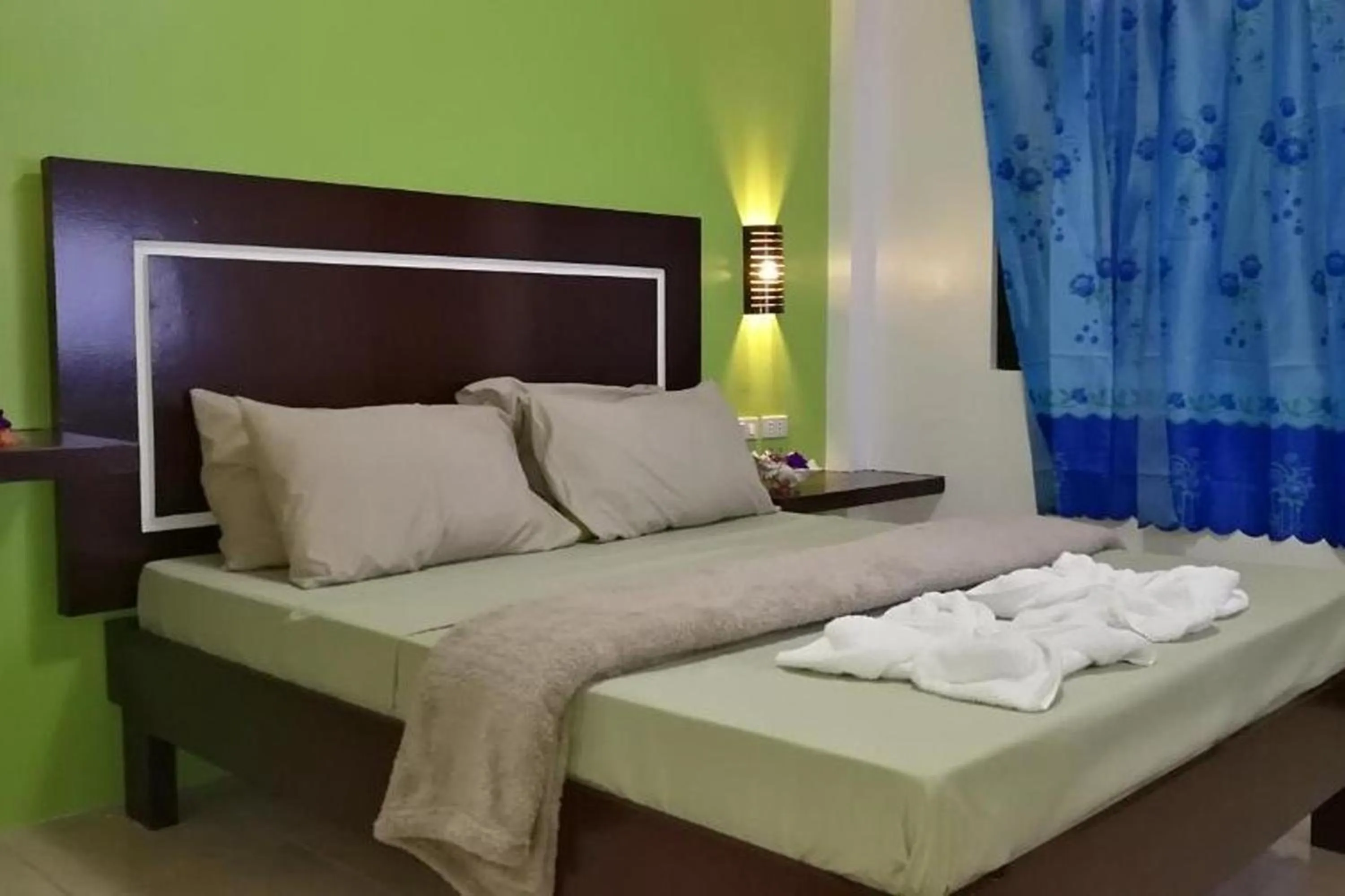 Bed in Bellevue Resort Puerto Galera