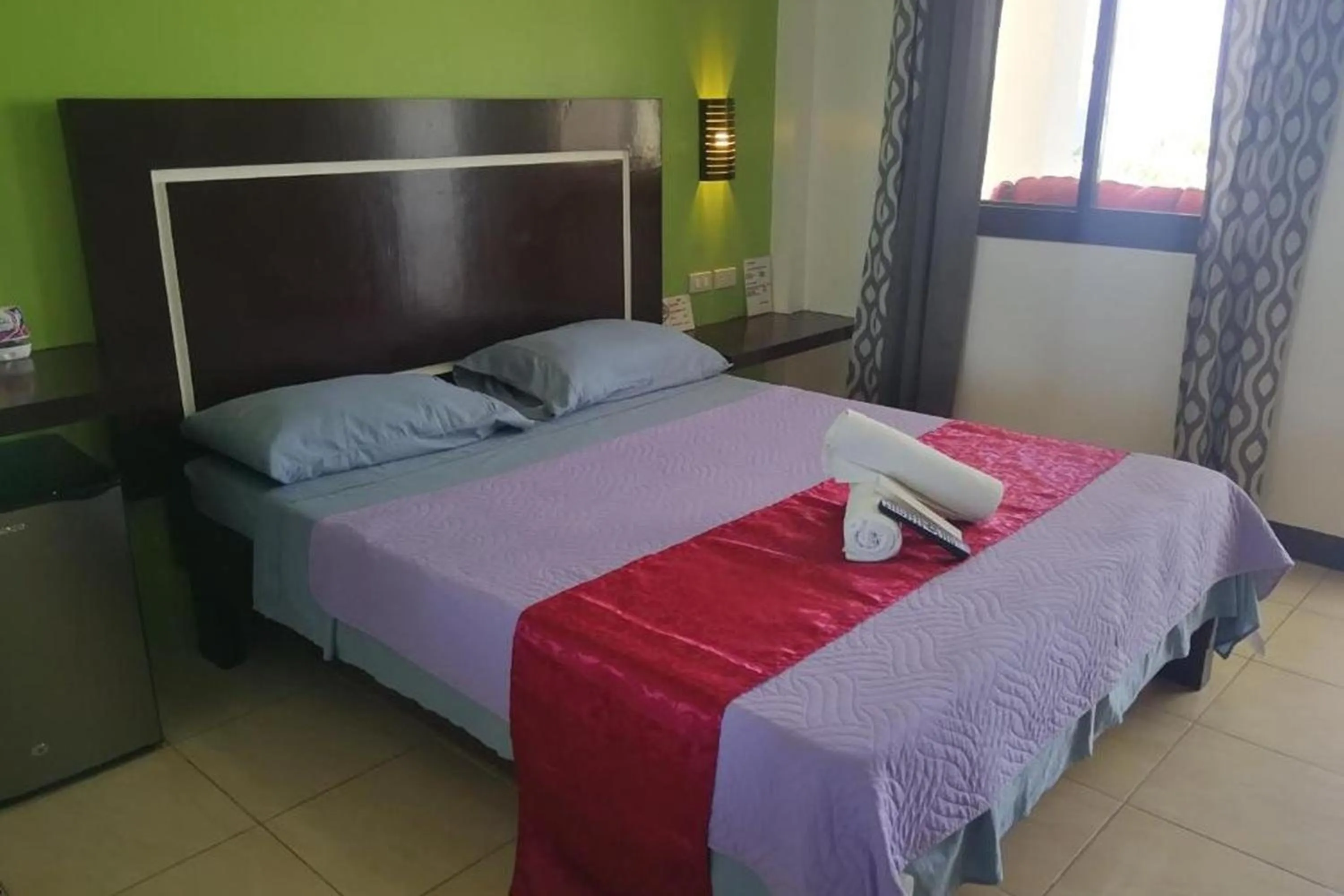 Bed in Bellevue Resort Puerto Galera