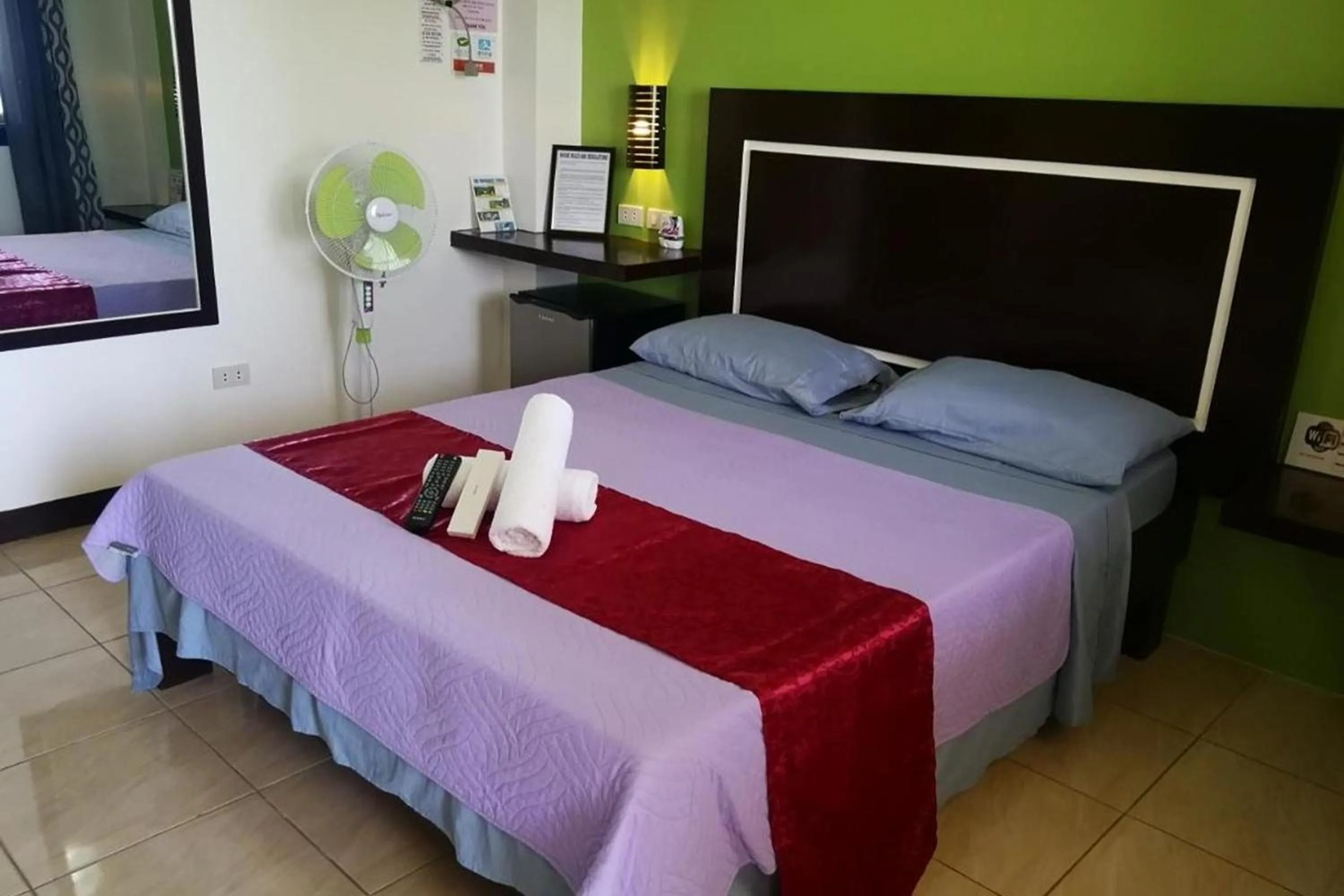 Bed in Bellevue Resort Puerto Galera