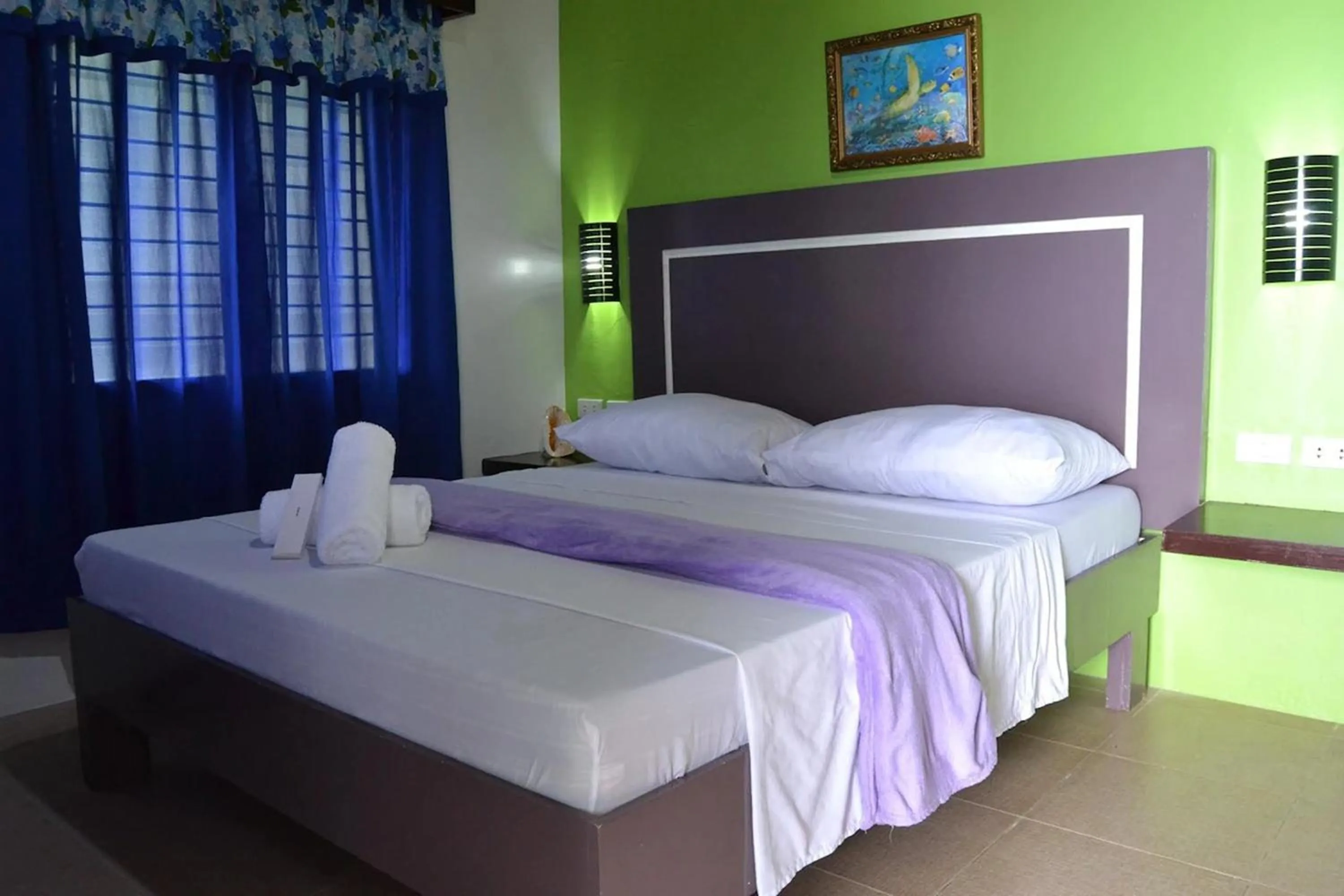 Bed in Bellevue Resort Puerto Galera