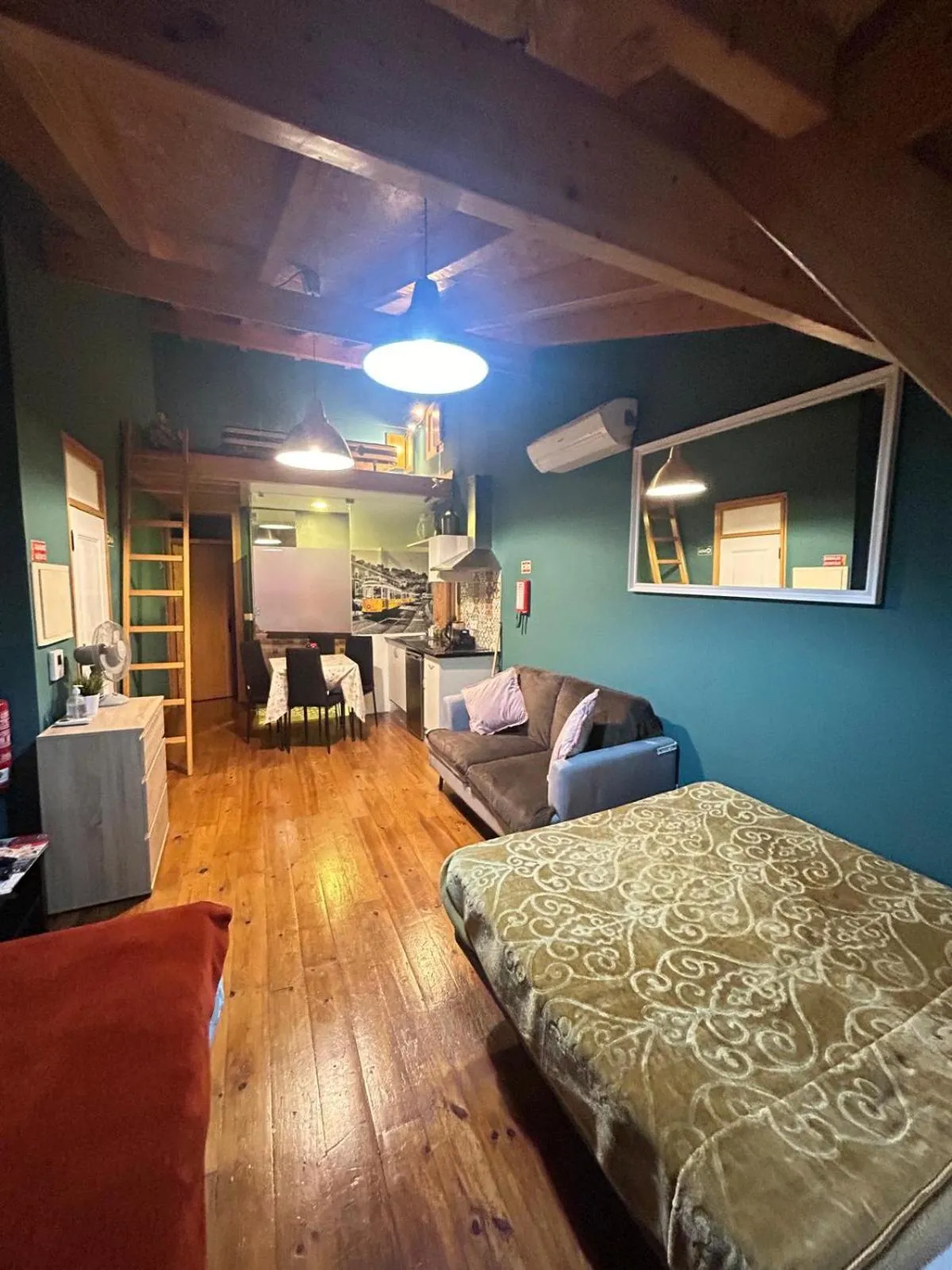 Bed in Sao Jorge Apartments & Suites