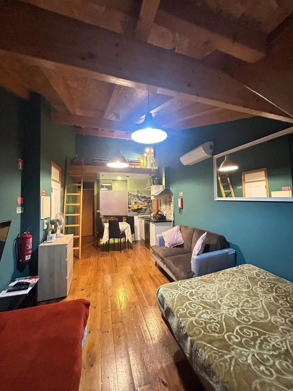 Bed in Sao Jorge Apartments & Suites