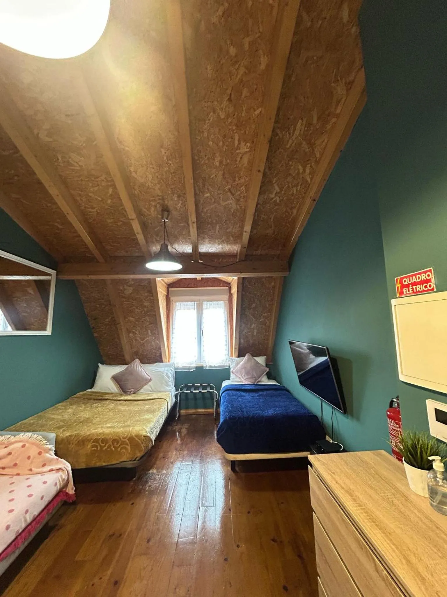 Bed in Sao Jorge Apartments & Suites