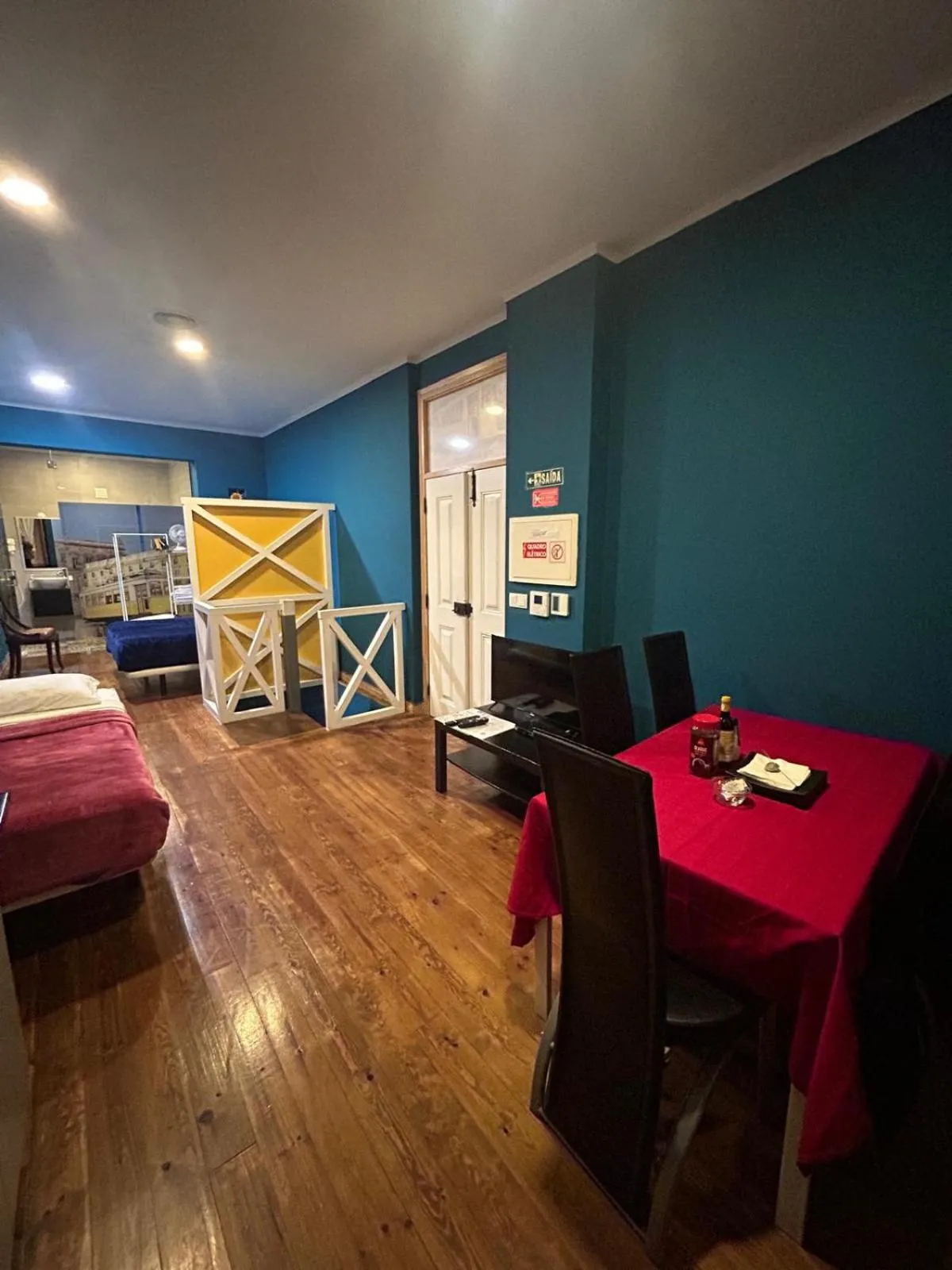 Living room, Bed in Sao Jorge Apartments & Suites