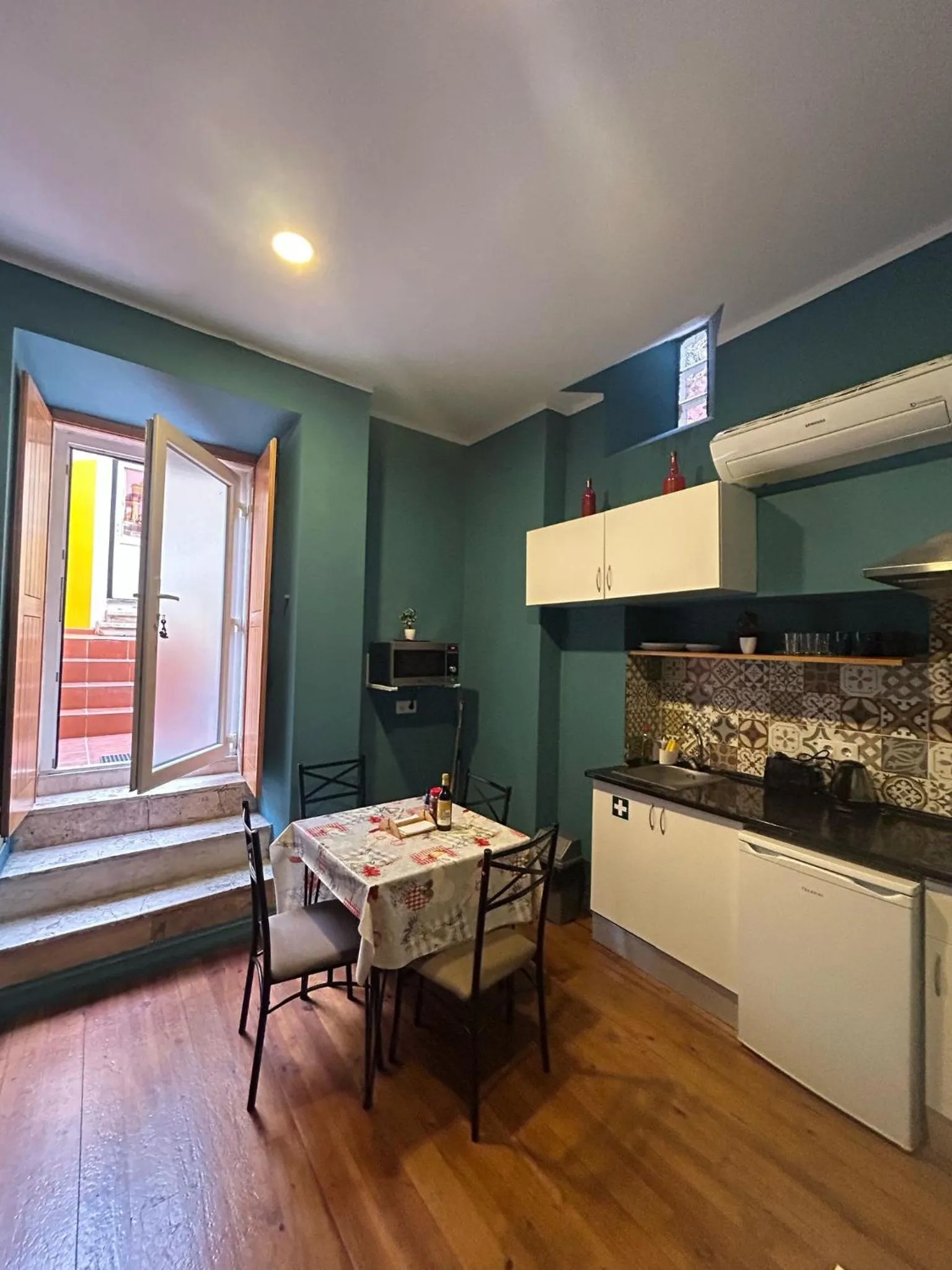 Kitchen or kitchenette in Sao Jorge Apartments & Suites