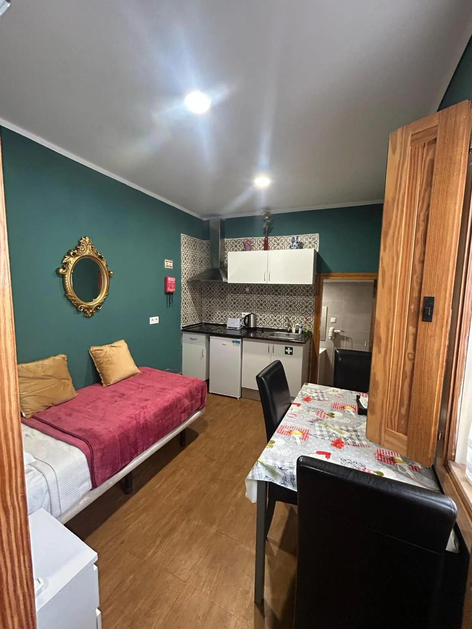 Bed in Sao Jorge Apartments & Suites