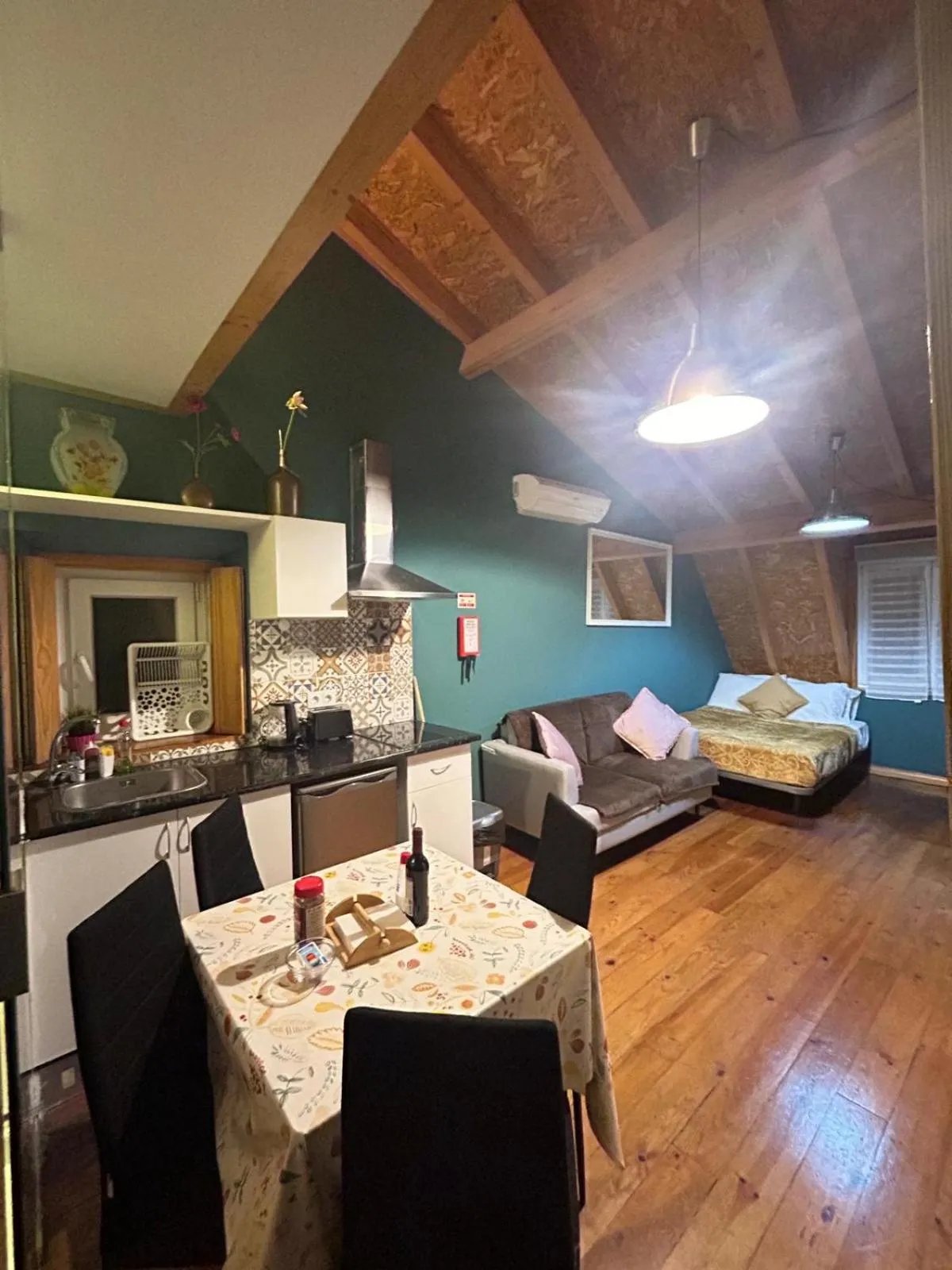 Bed in Sao Jorge Apartments & Suites