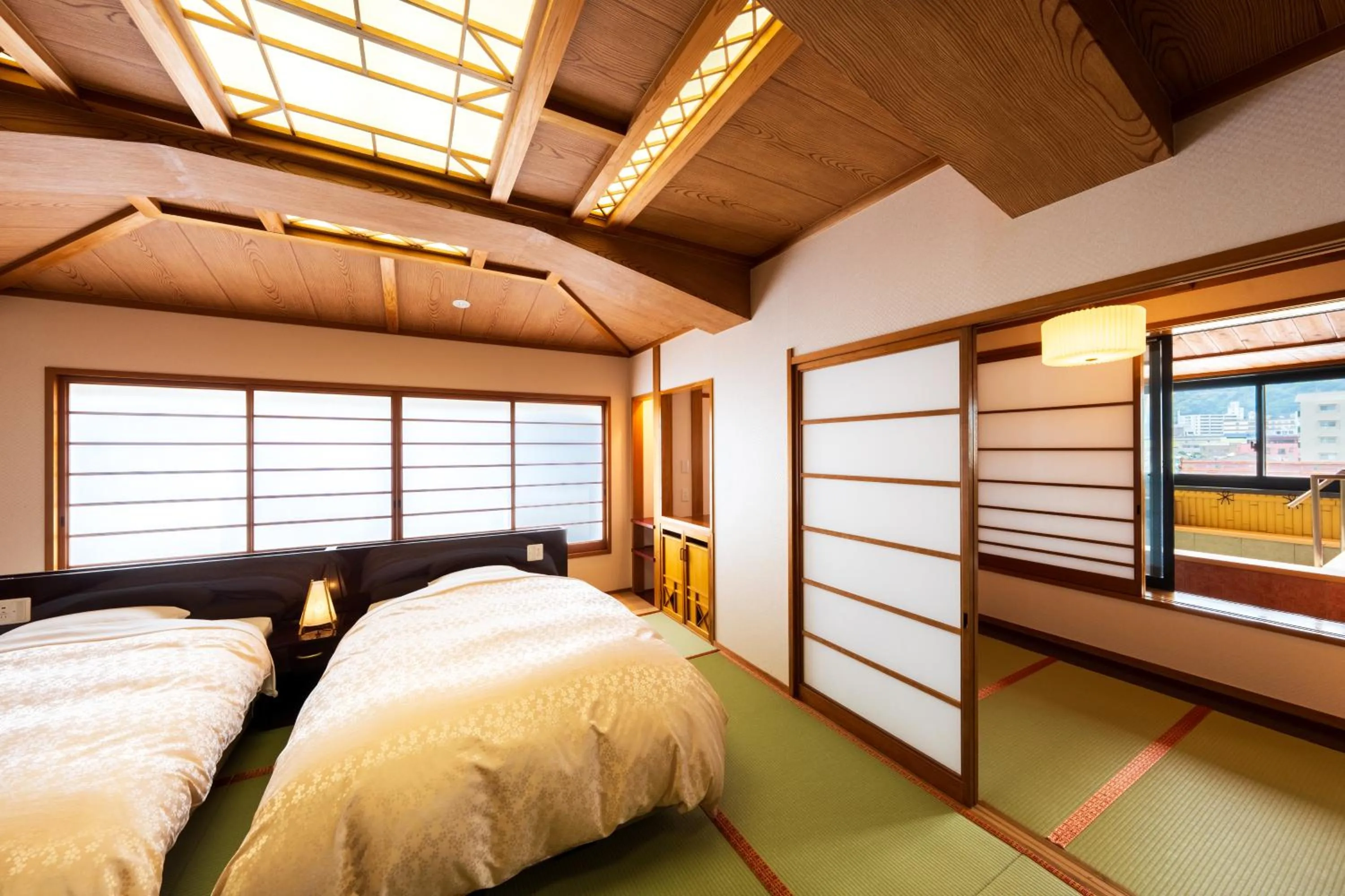 Photo of the whole room, Bed in BeppuOnsen Hotel Sansenkaku