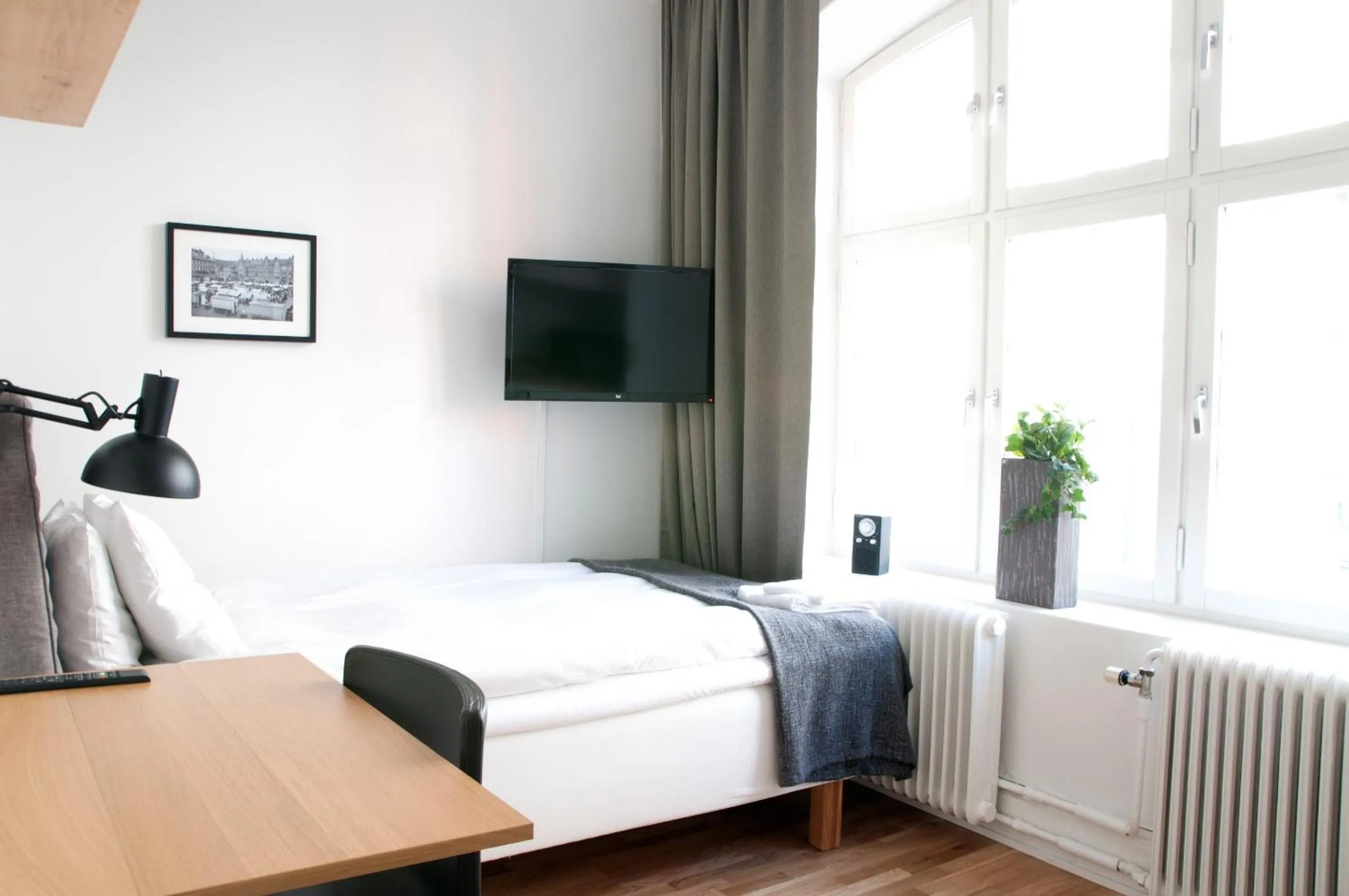 Bed in Continental Apartment Hotel Sundsvall