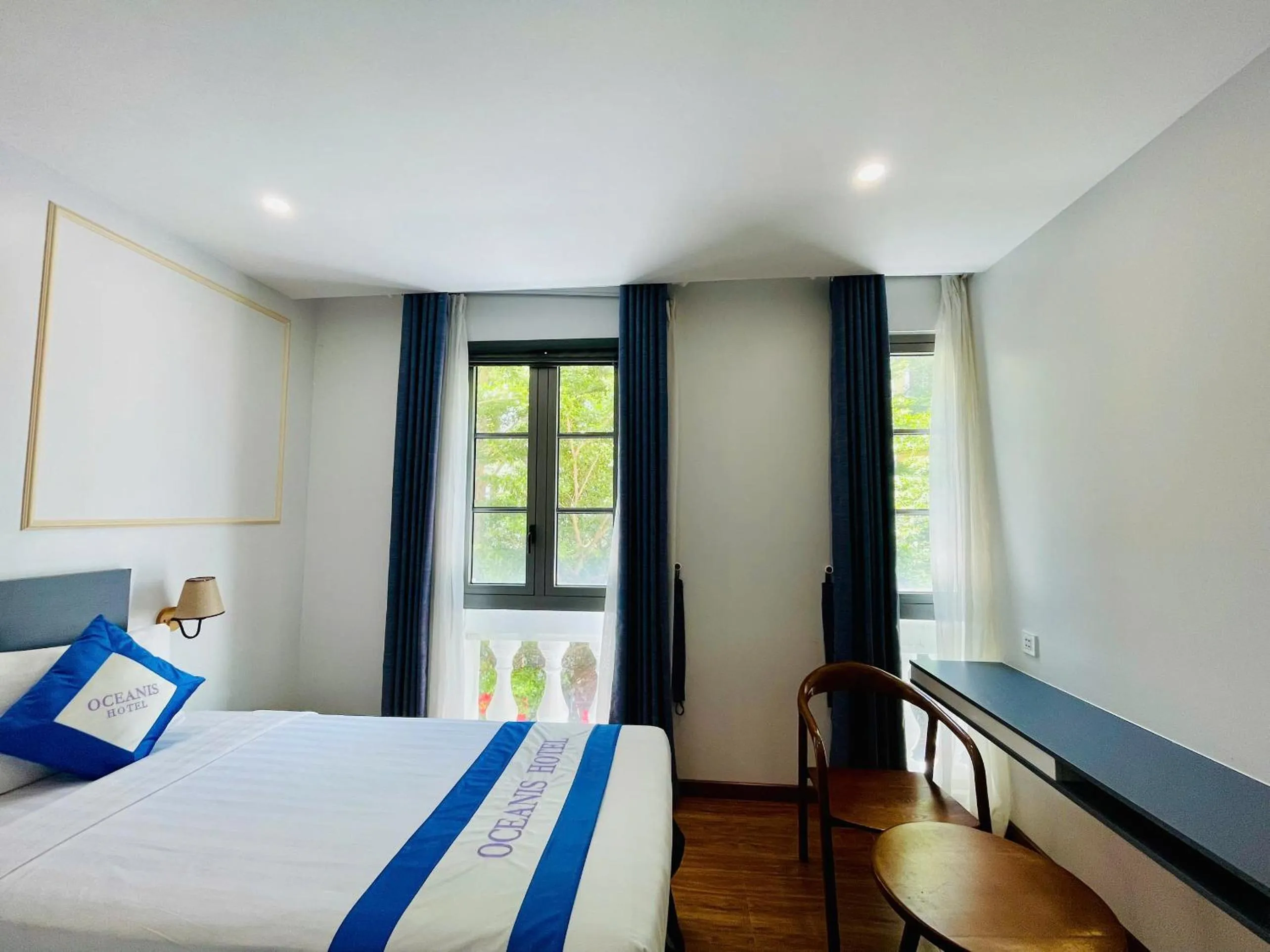 Bed in Oceanis Hotel