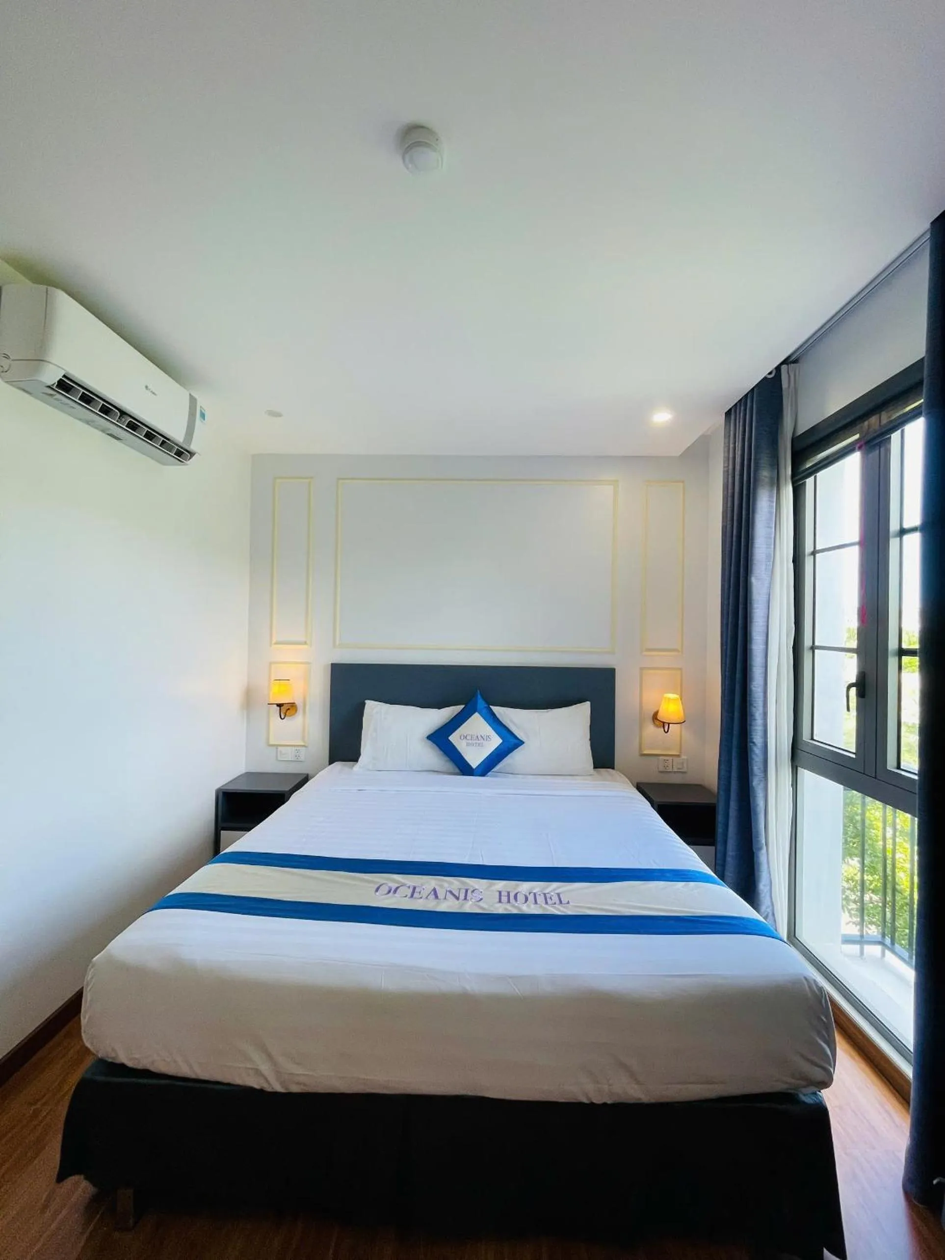 Bed in Oceanis Hotel