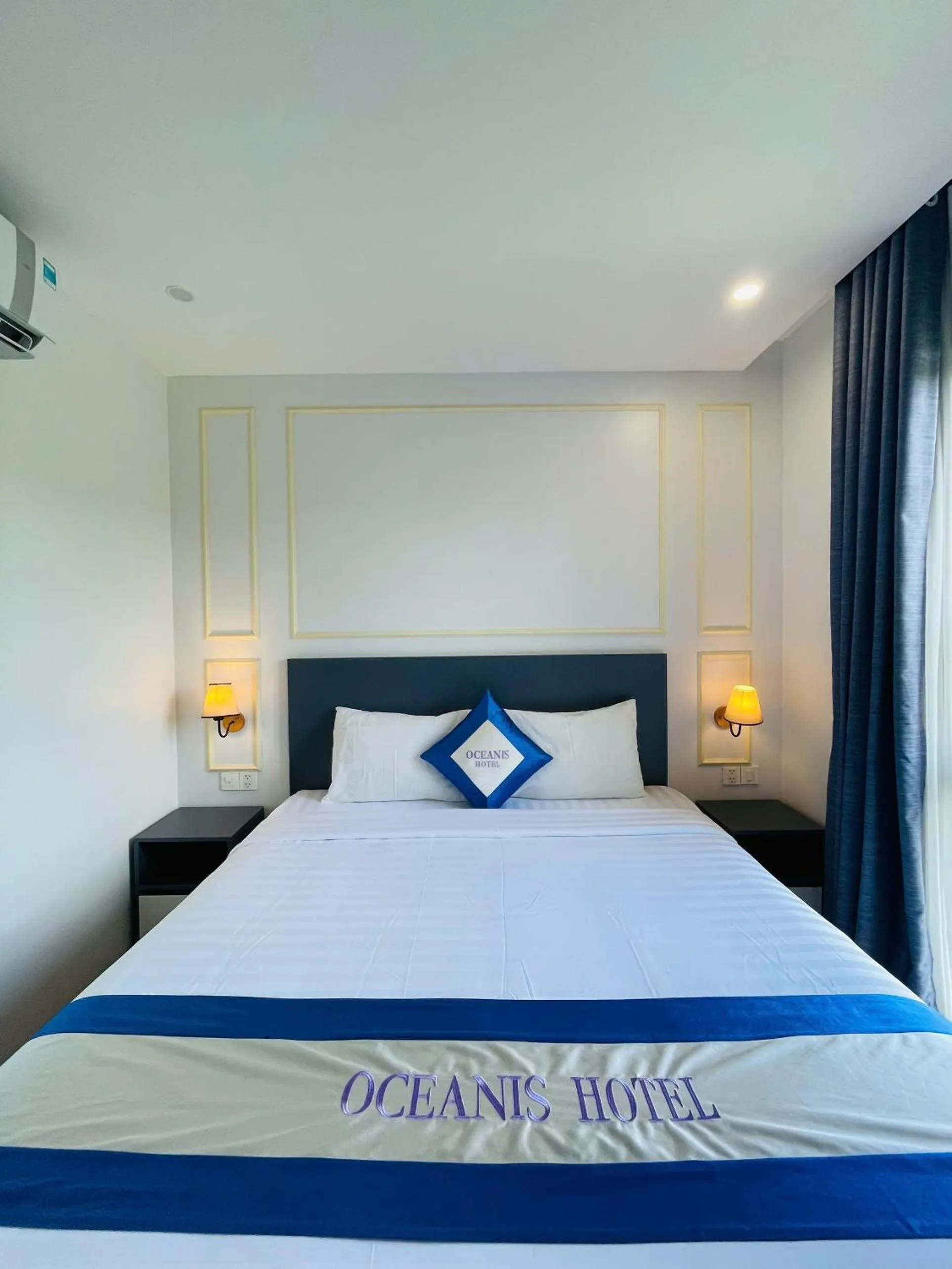 Bed in Oceanis Hotel