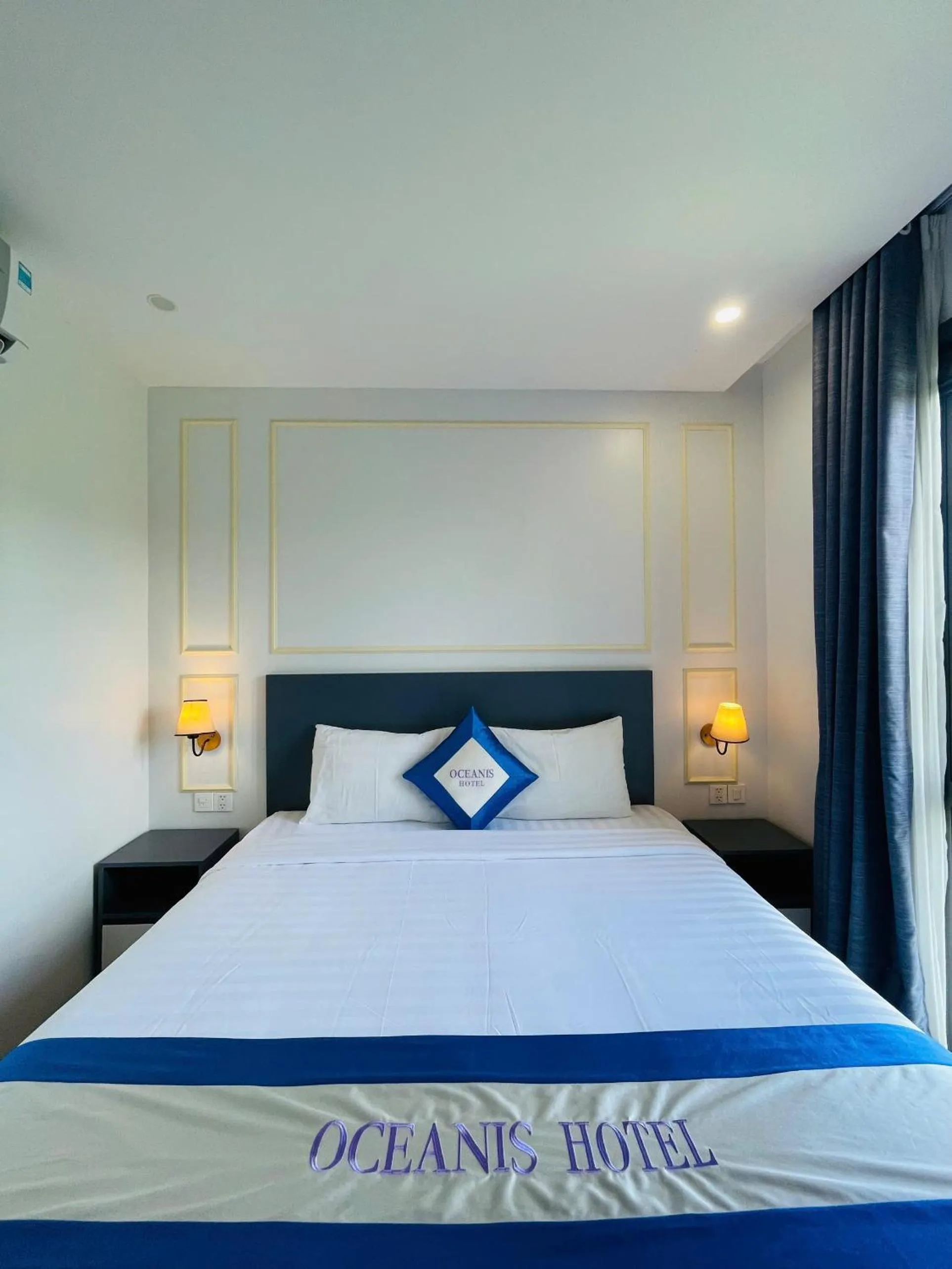 Bed in Oceanis Hotel