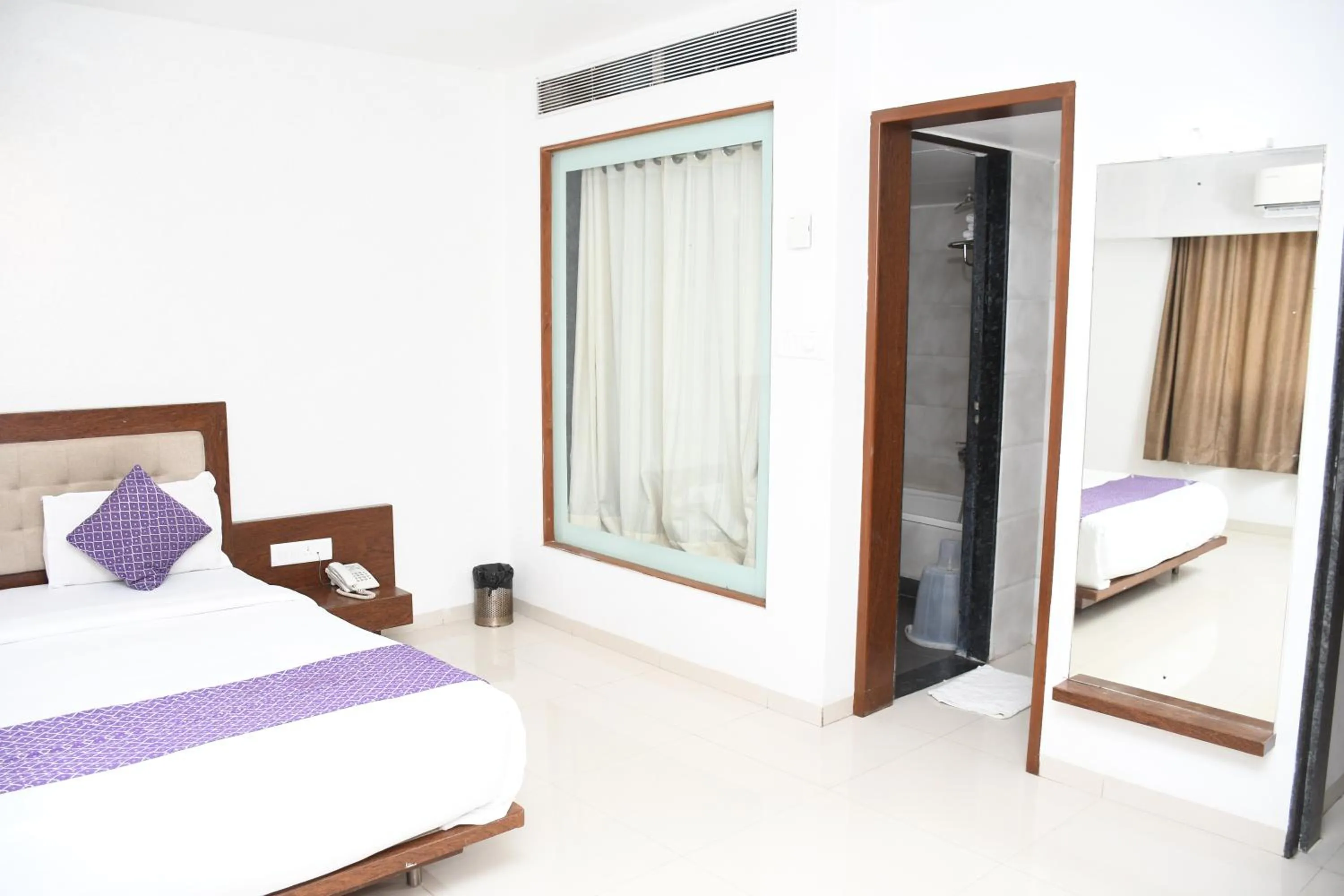 Bed in Pushpak Resort