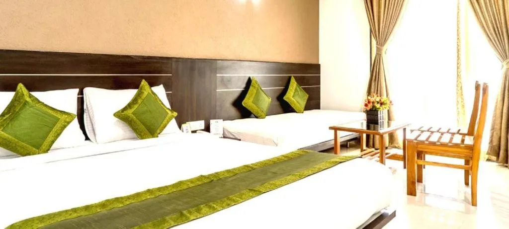 Bed in Pushpak Resort